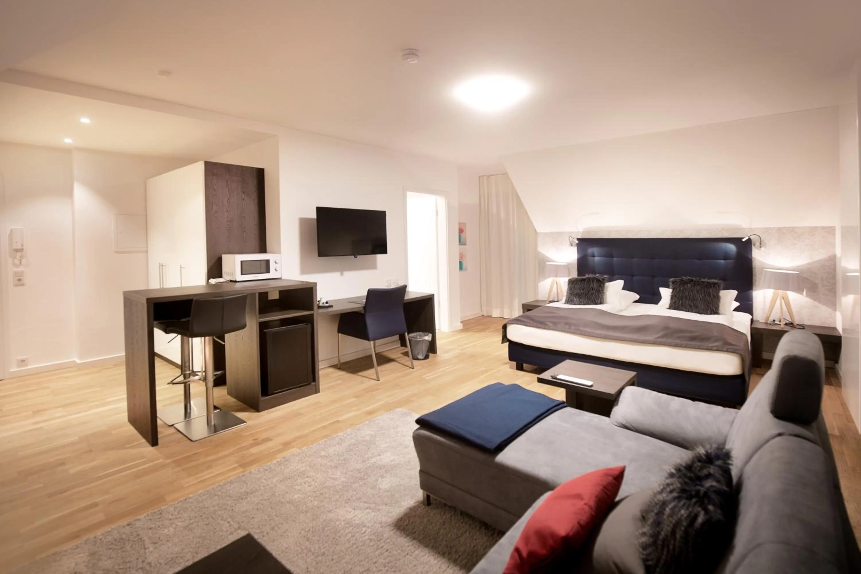 Living room in Boardinghouse by M&K