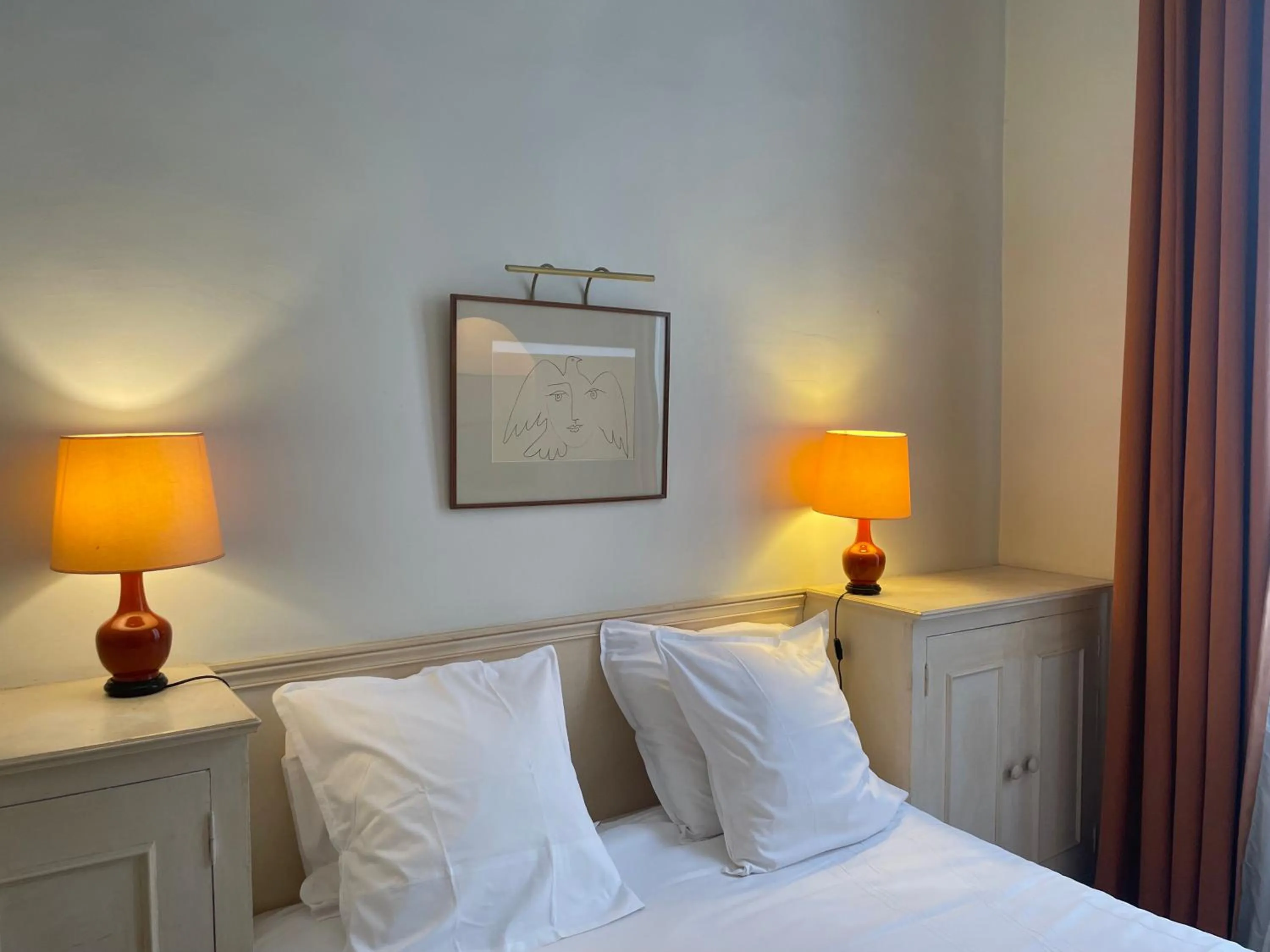 Bedroom in Hôtel Du Jeu De Paume