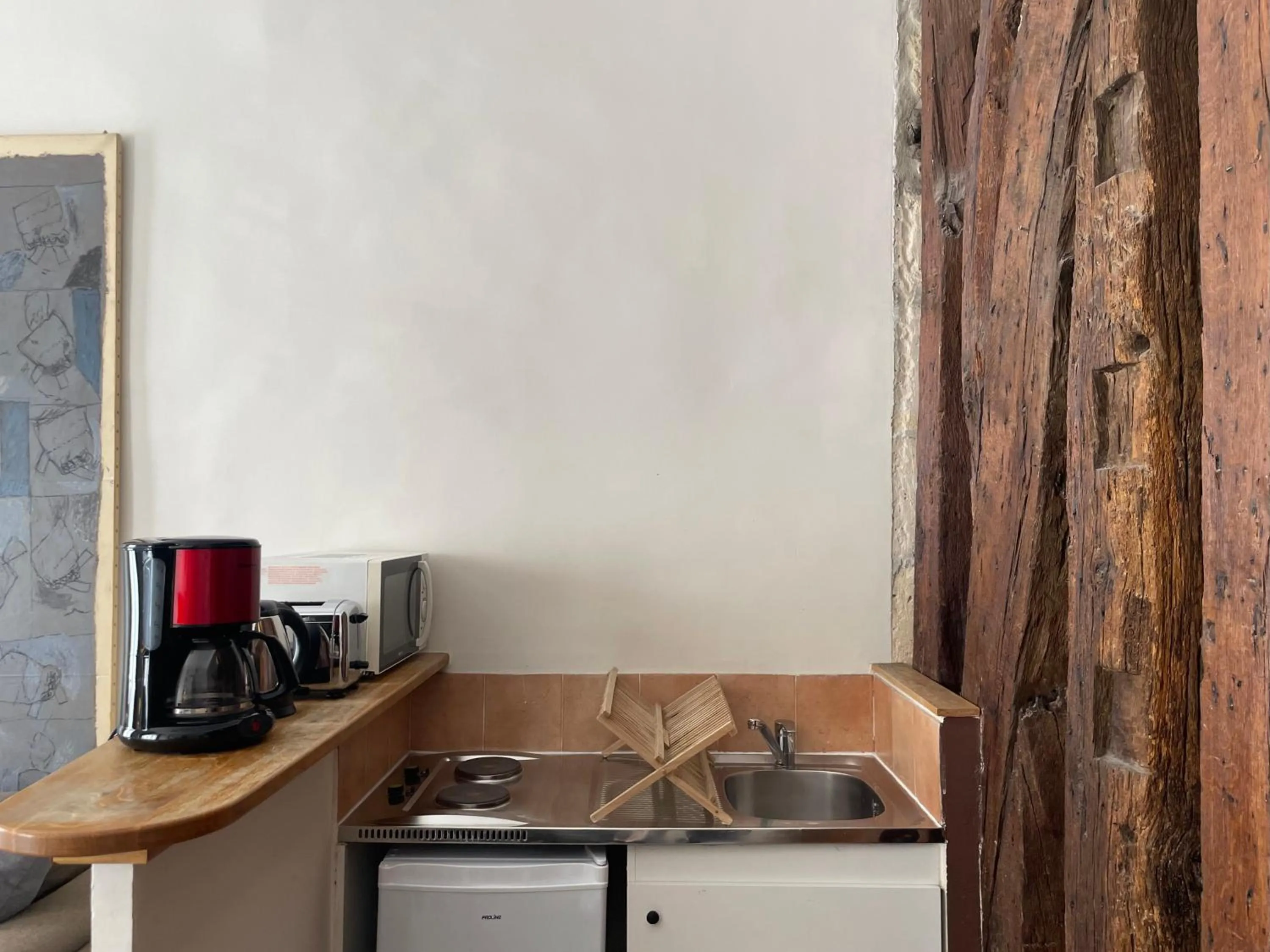 Kitchen or kitchenette in Hôtel Du Jeu De Paume