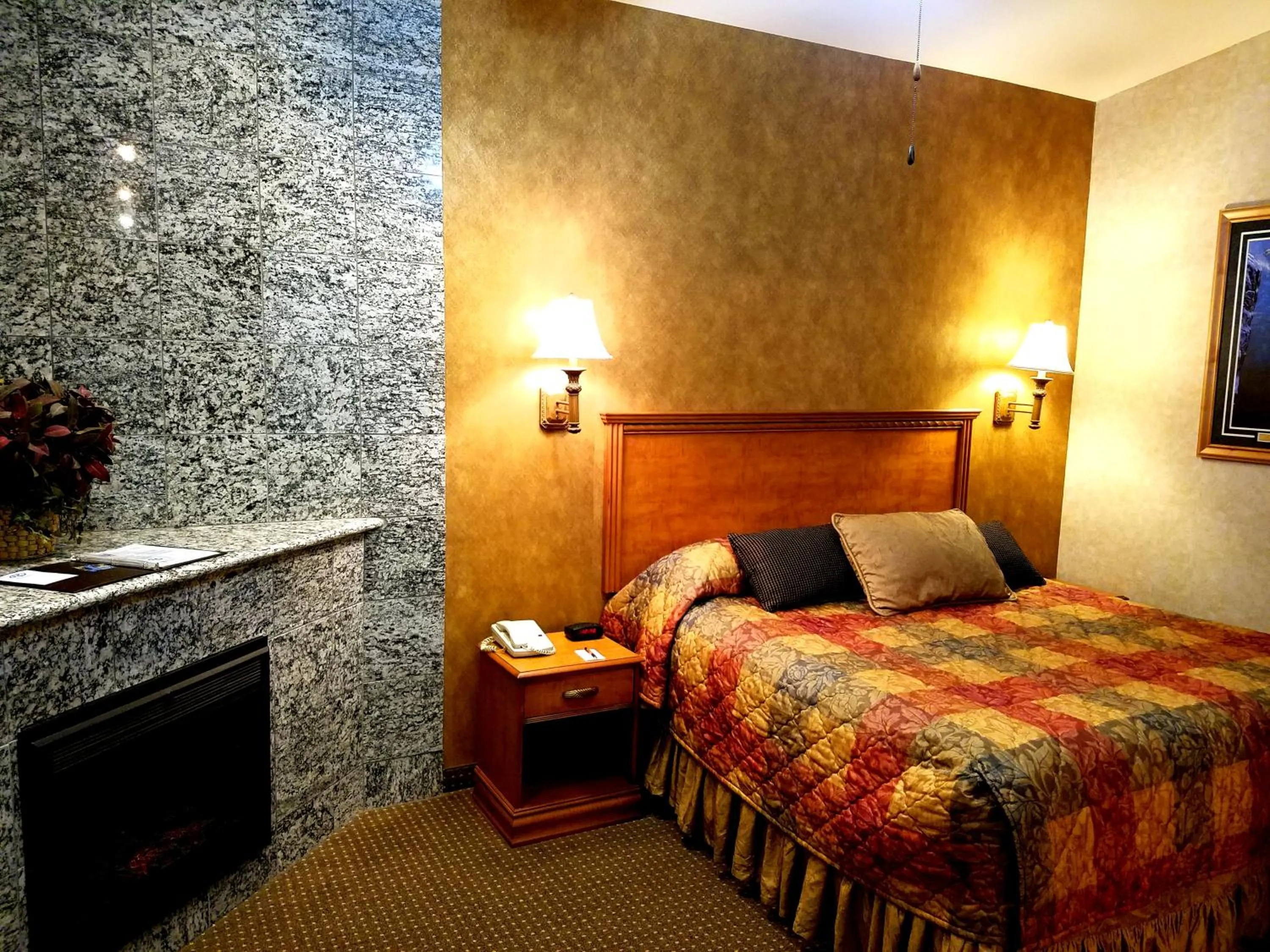 Bed in Rushmore Express & Suites