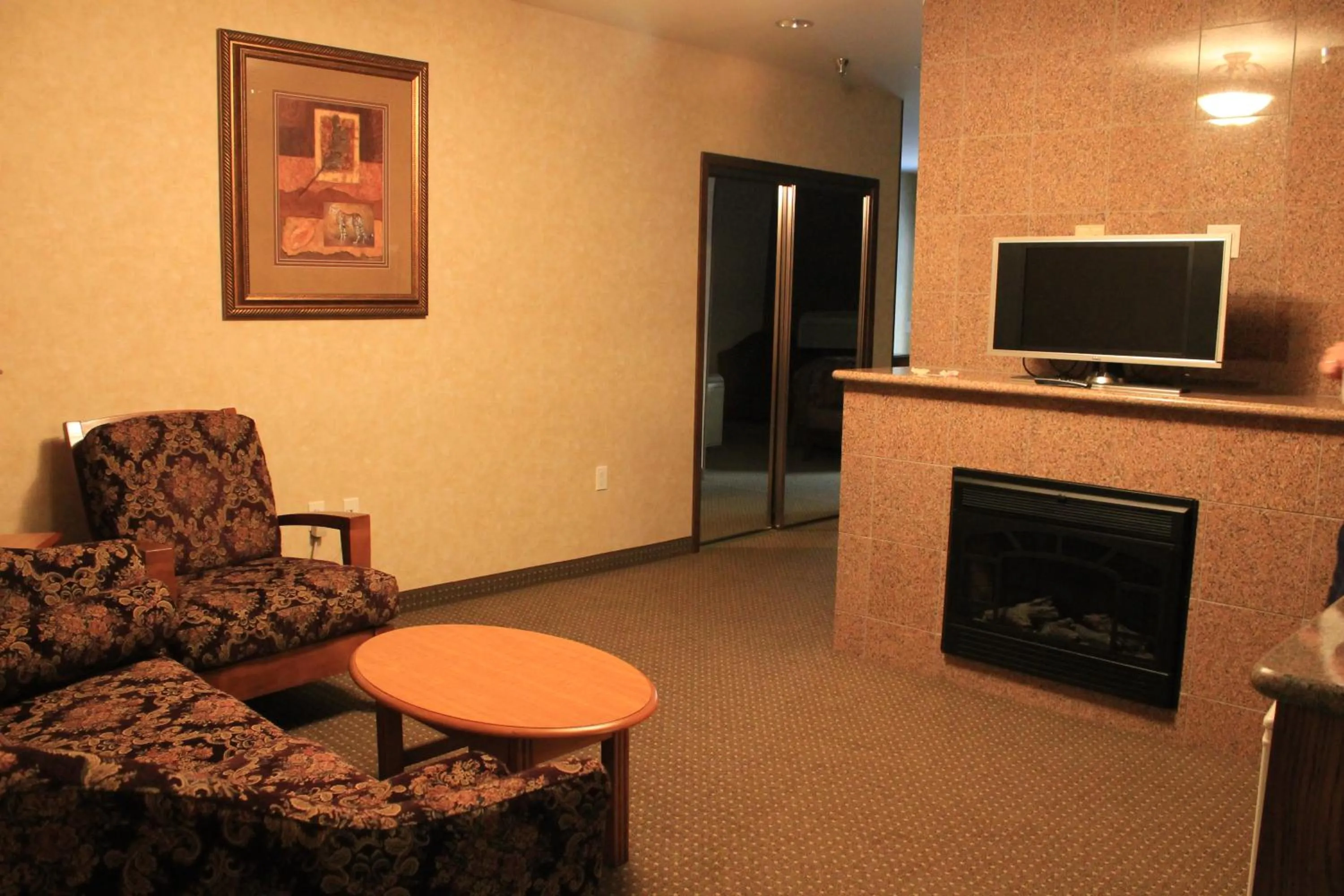 Communal lounge/ TV room in Rushmore Express & Suites