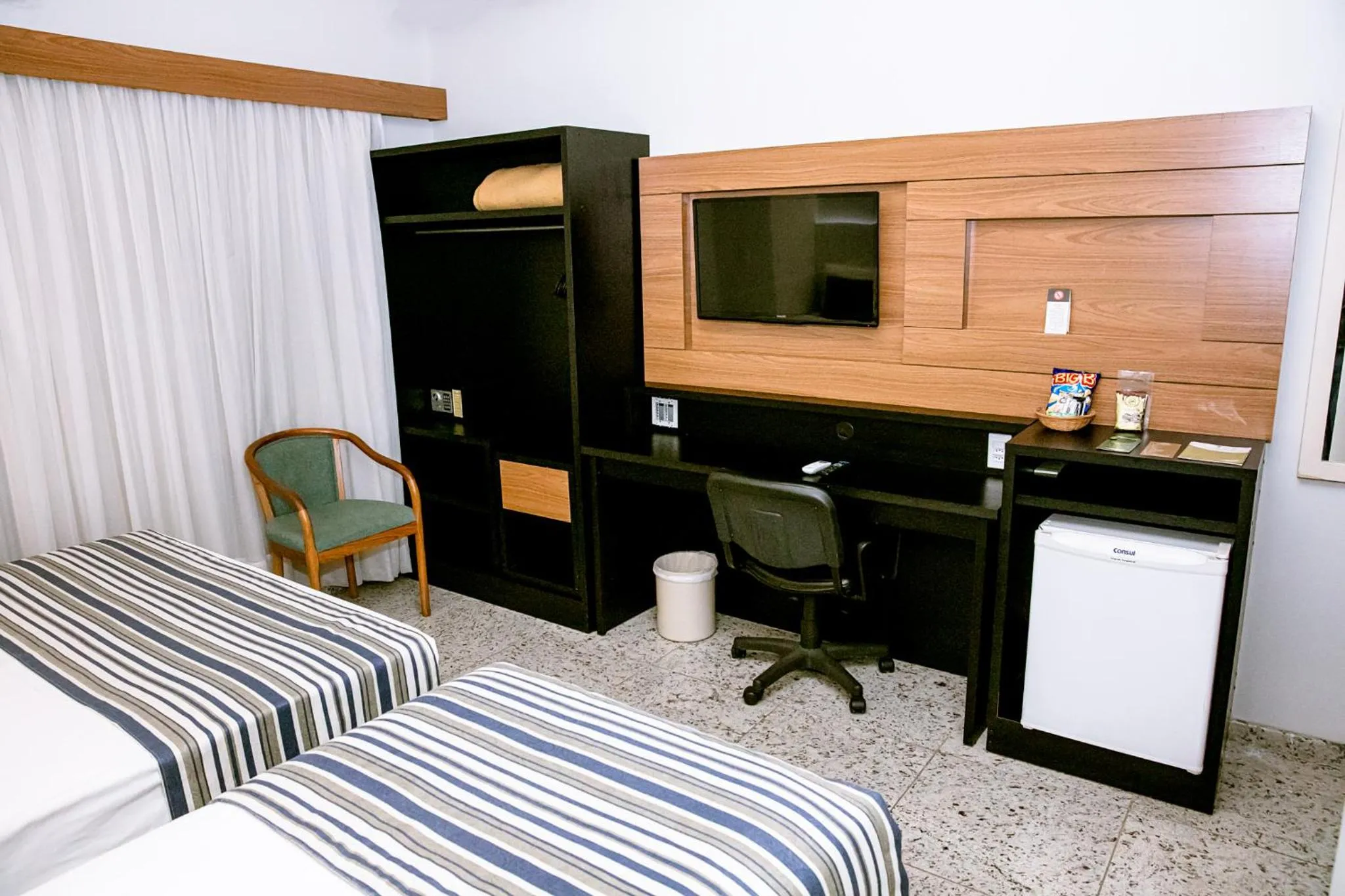 Bed in Fênix Hotel Varginha