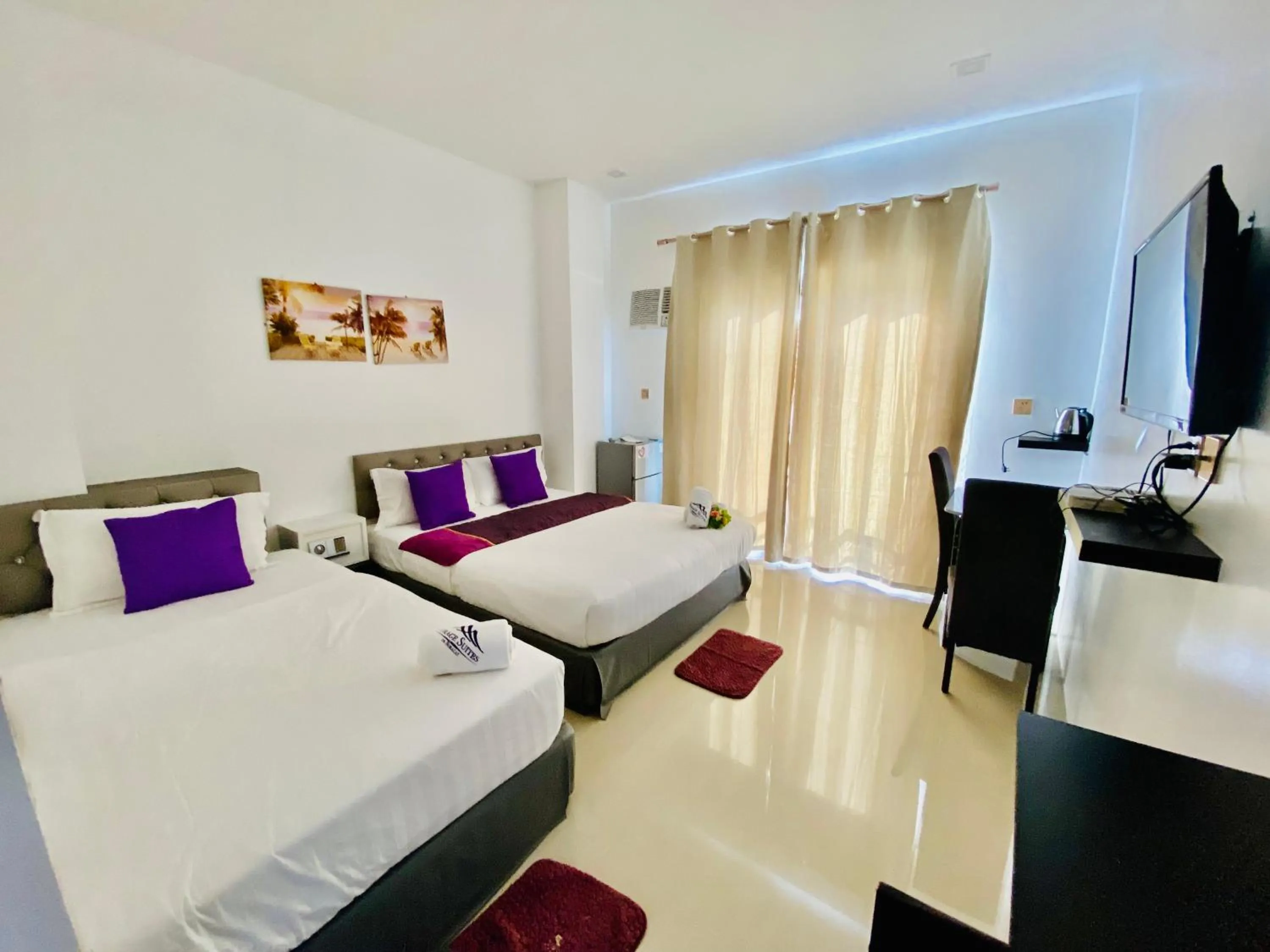 Bed in Mirage Suites de Boracay