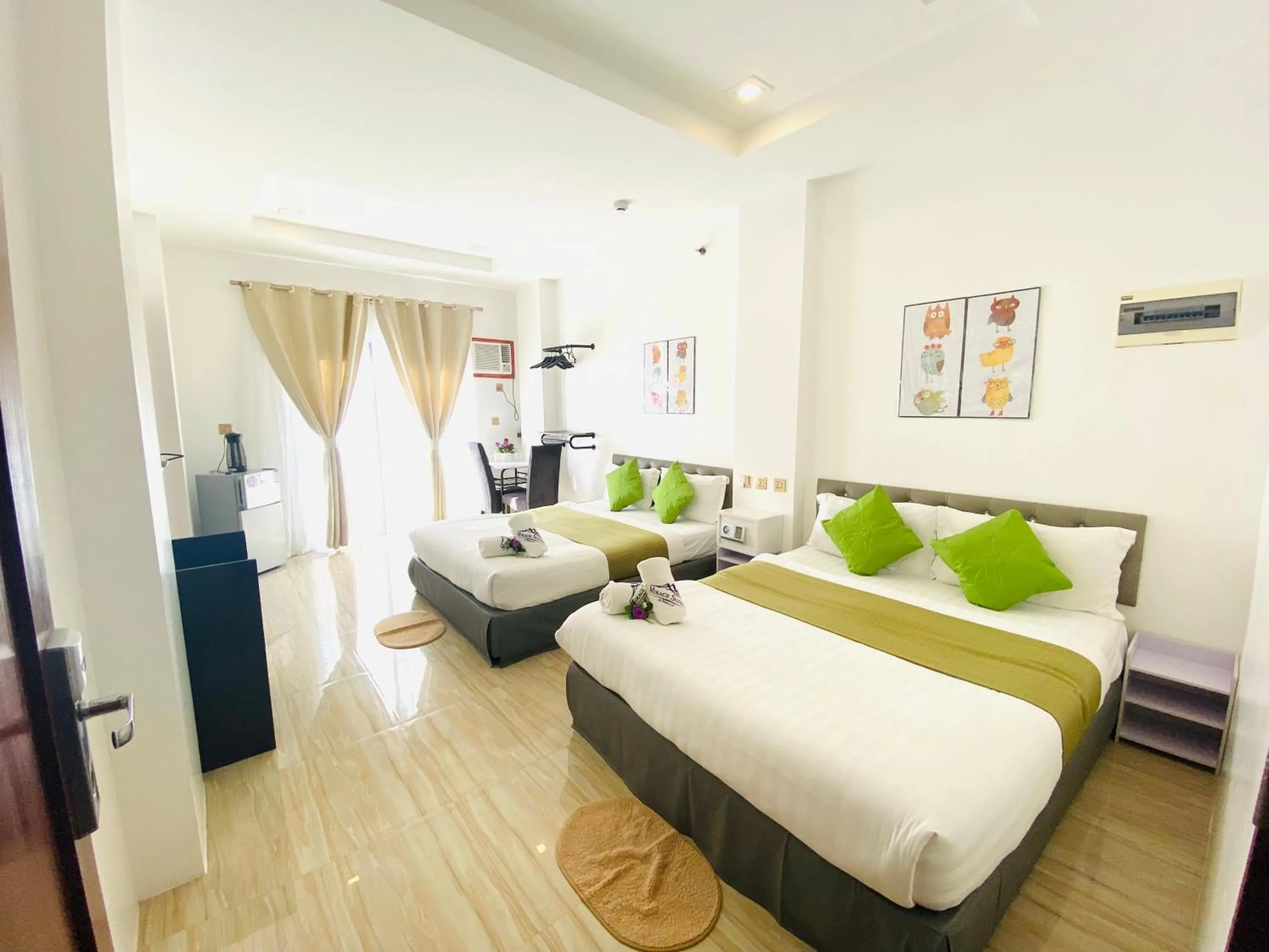 Bed in Mirage Suites de Boracay