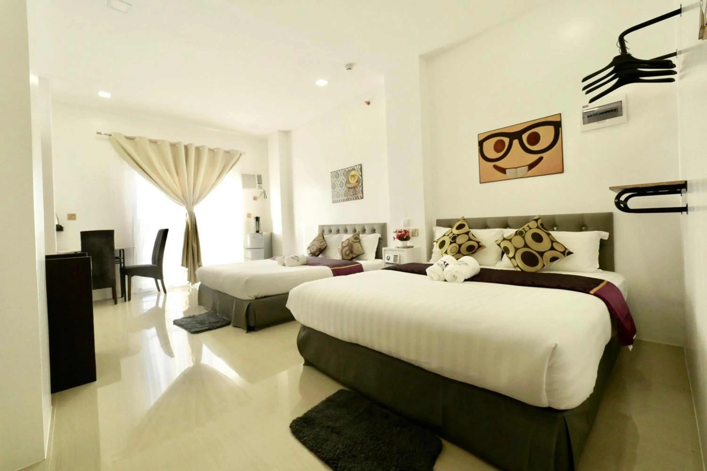 Photo of the whole room, Bed in Mirage Suites de Boracay