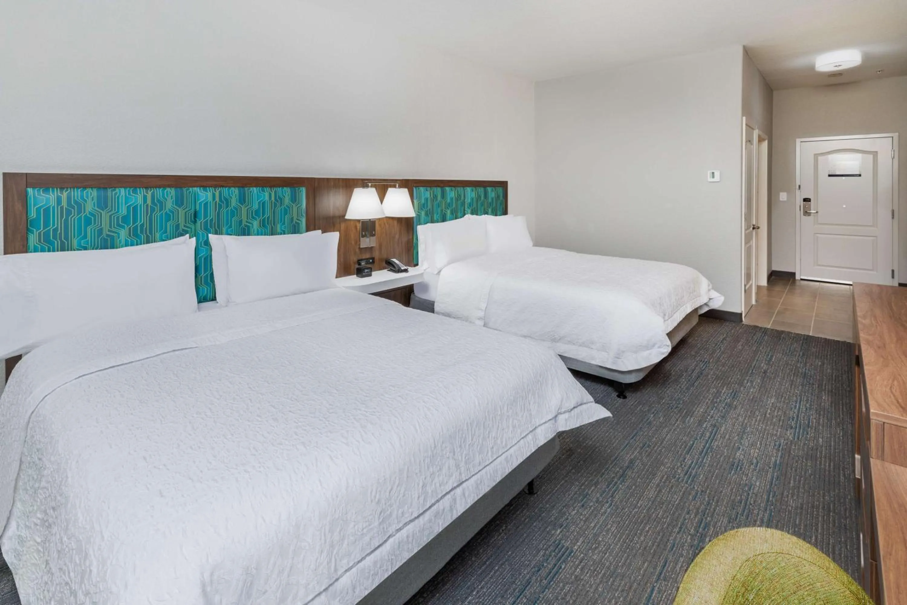 Bed in Hampton Inn & Suites Dallas I-30 Cockrell Hill, Tx