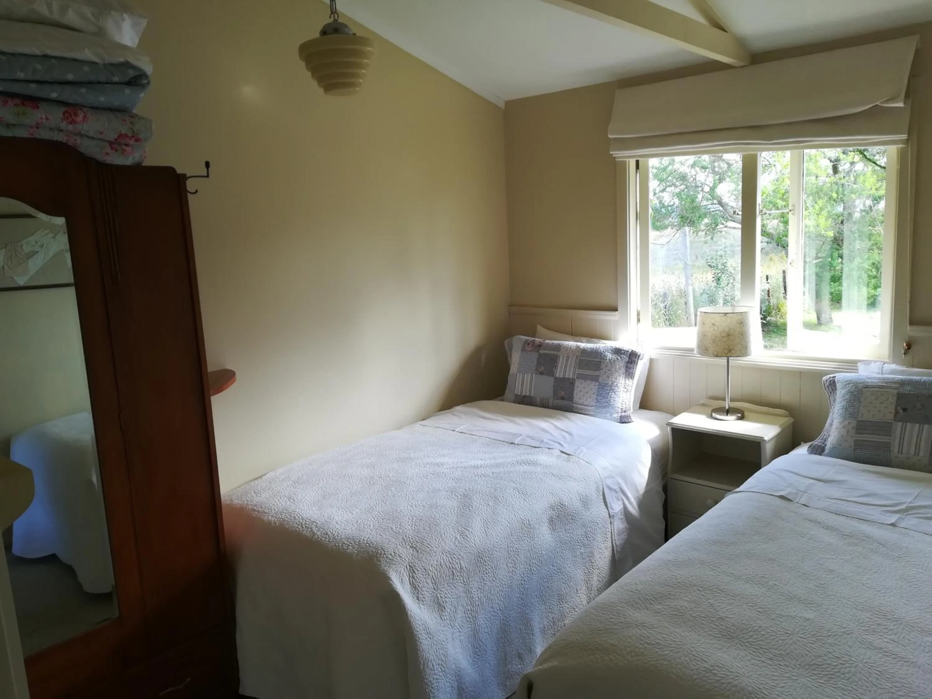 Bed in B&B Blossom Cottage