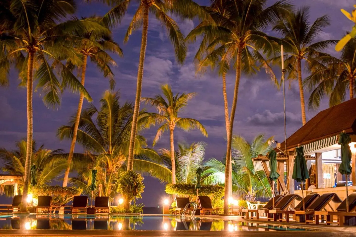 Swimming pool in Coco Palm Beach Resort - SHA Extra Plus