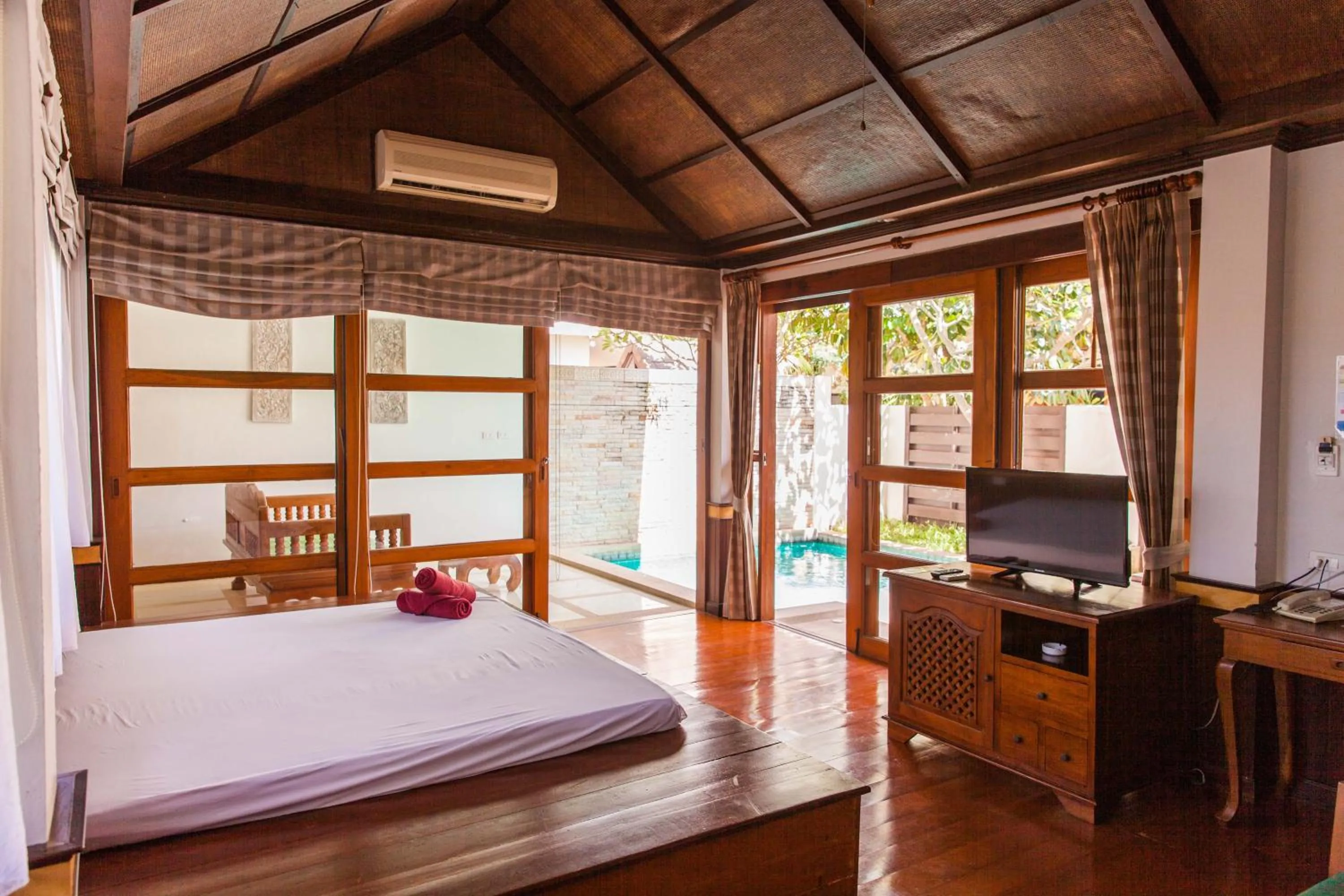 Bed in Coco Palm Beach Resort - SHA Extra Plus