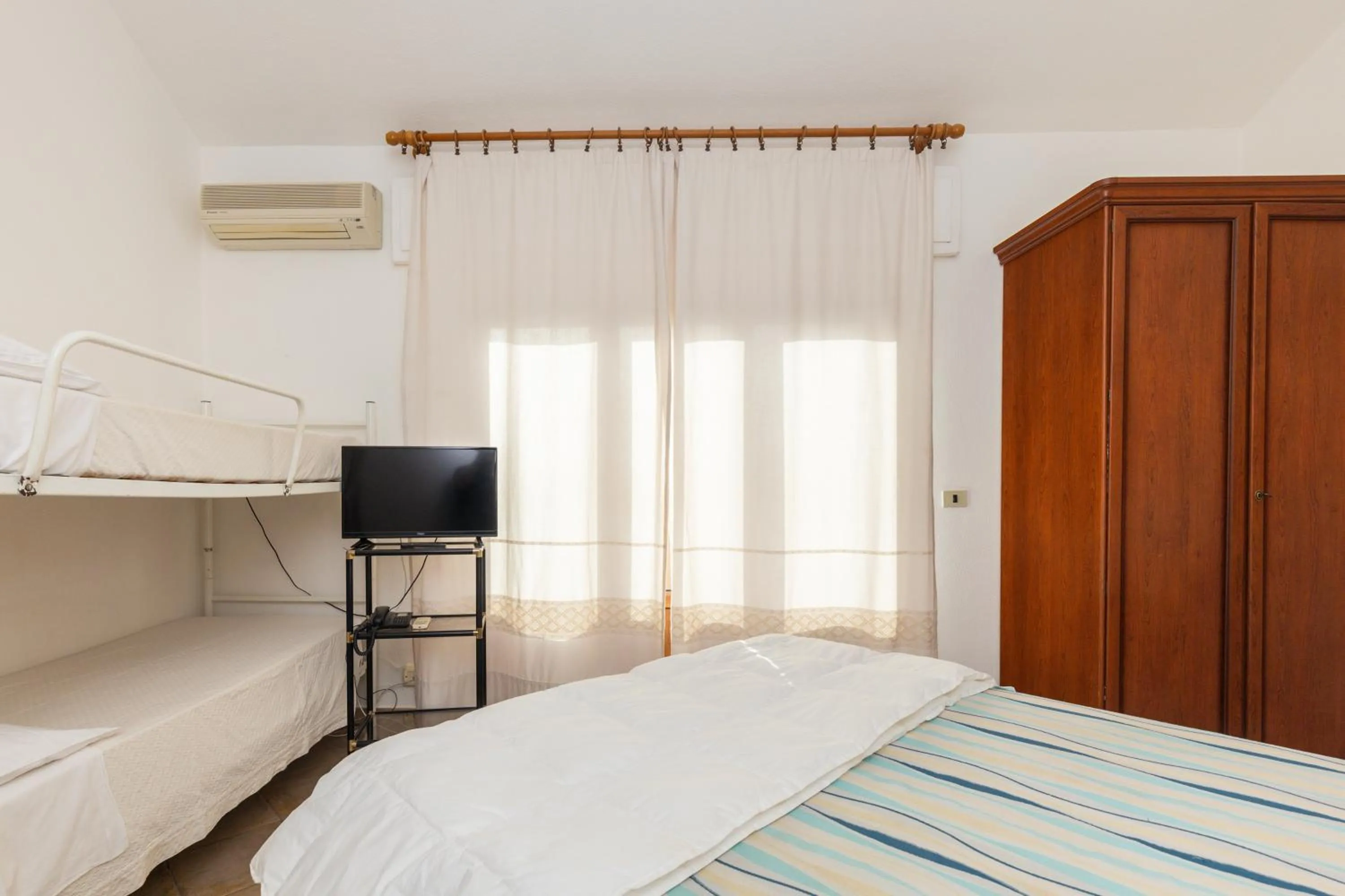 Bedroom, Bed in Hotel Donatella