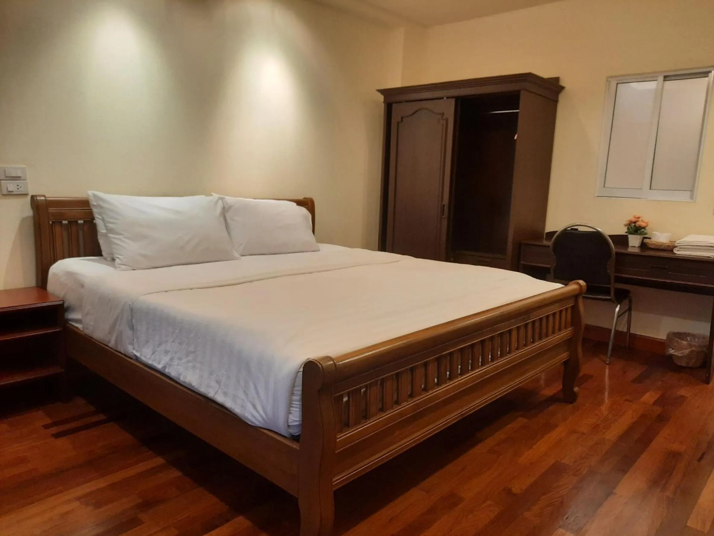Bed in Prince Hotel Chiang Mai