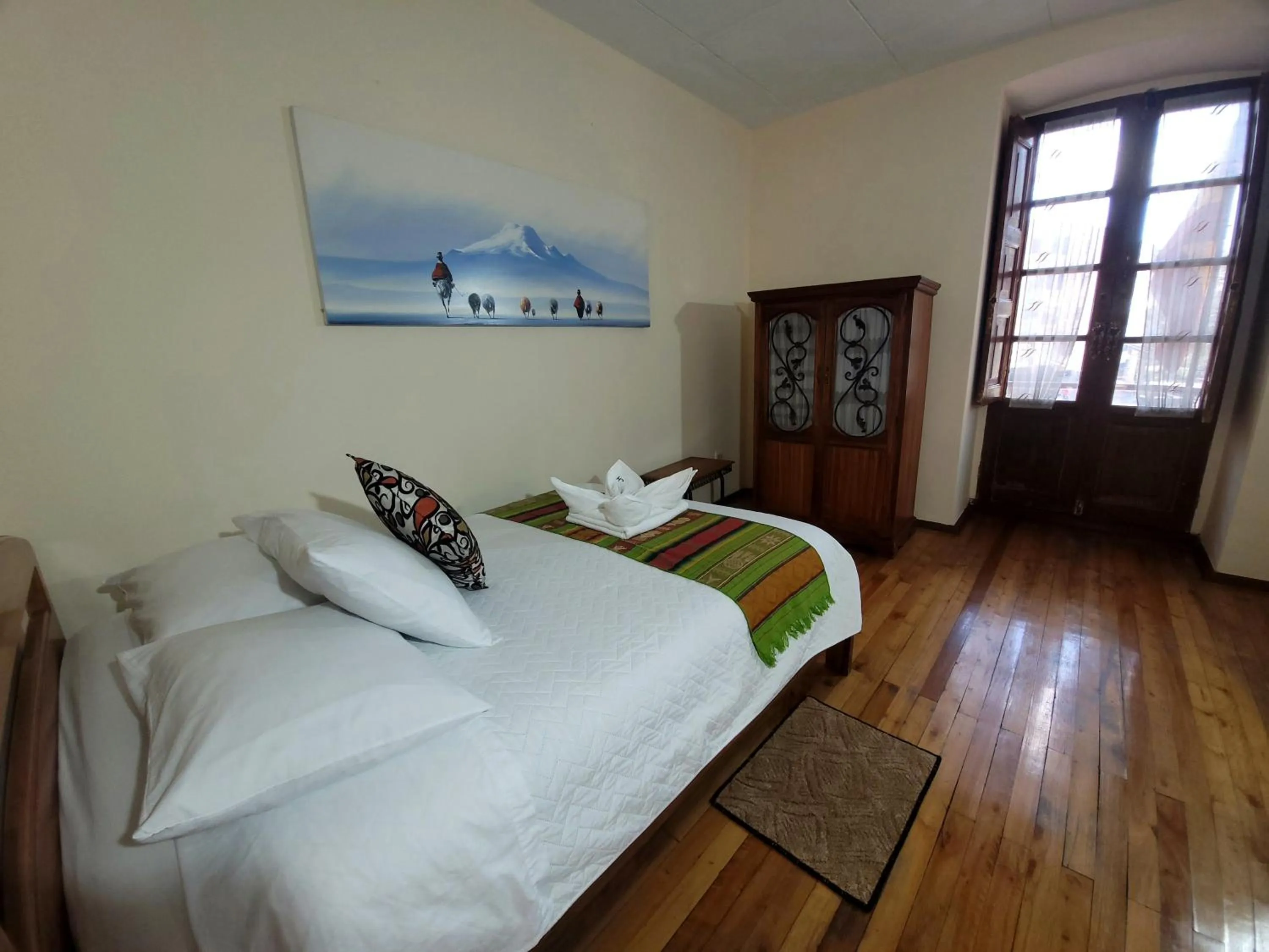 Bed in Mía Leticia B&B