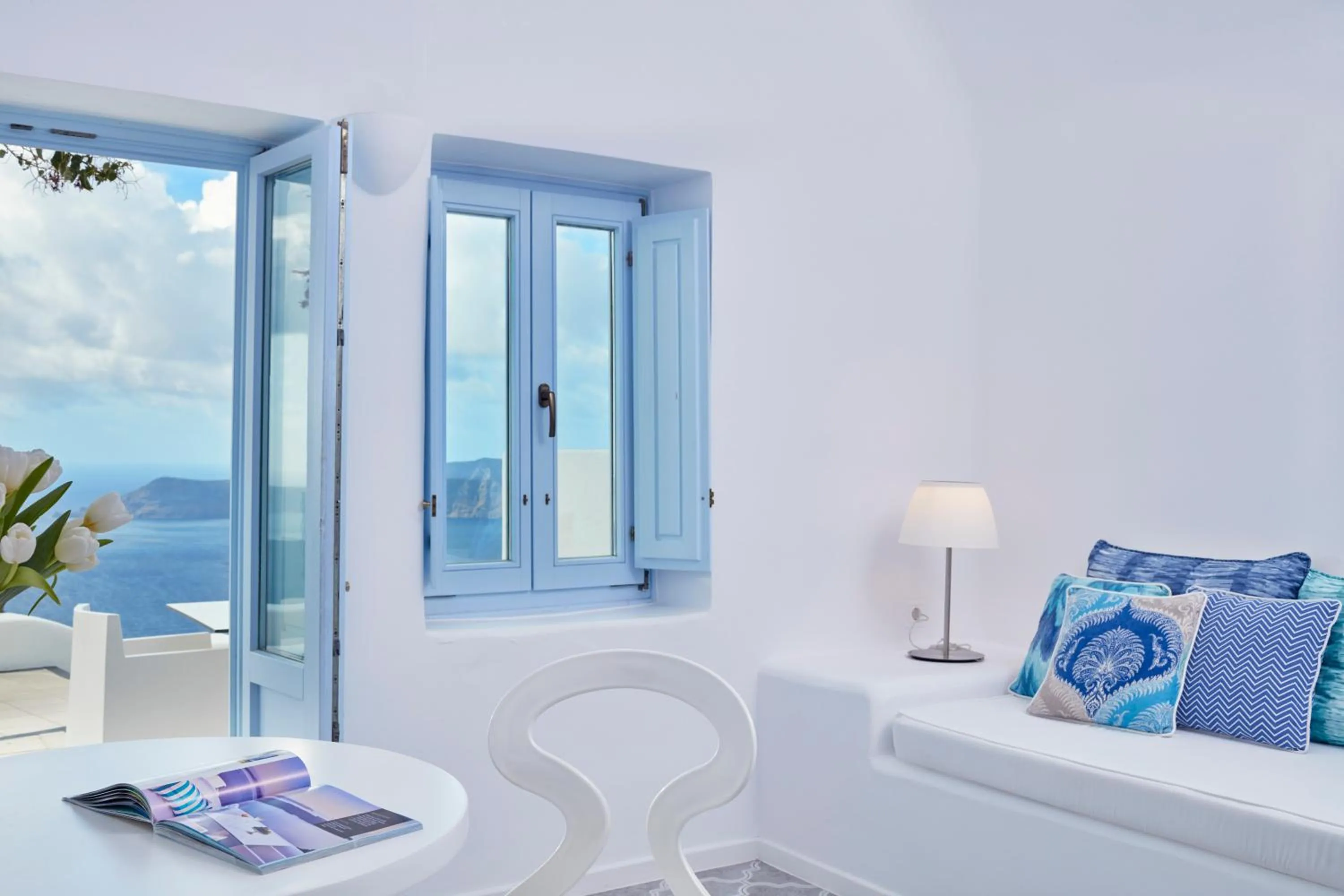 Seating area, Bed in Astra Suites