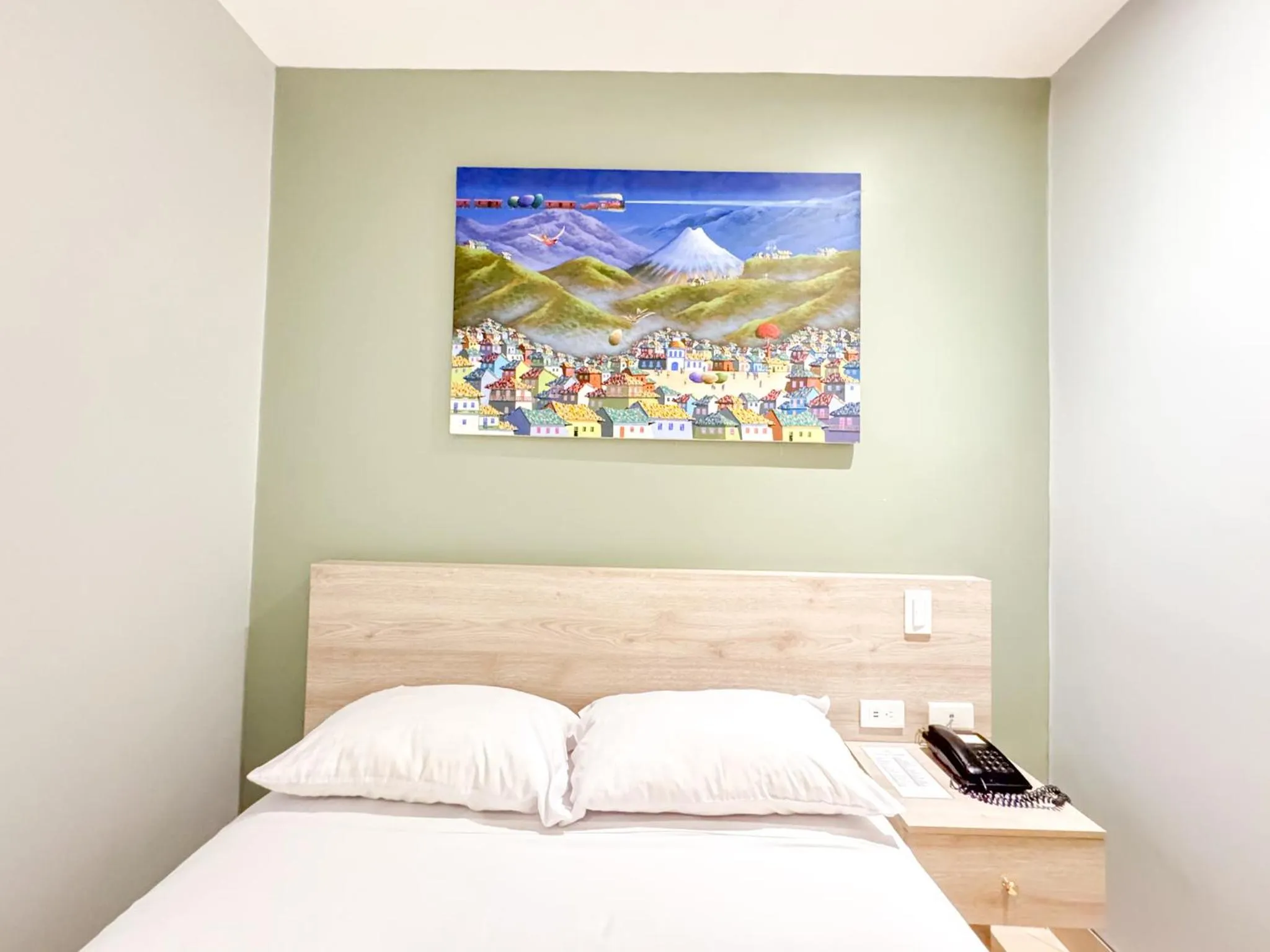 Bed in GH Sander Hotel