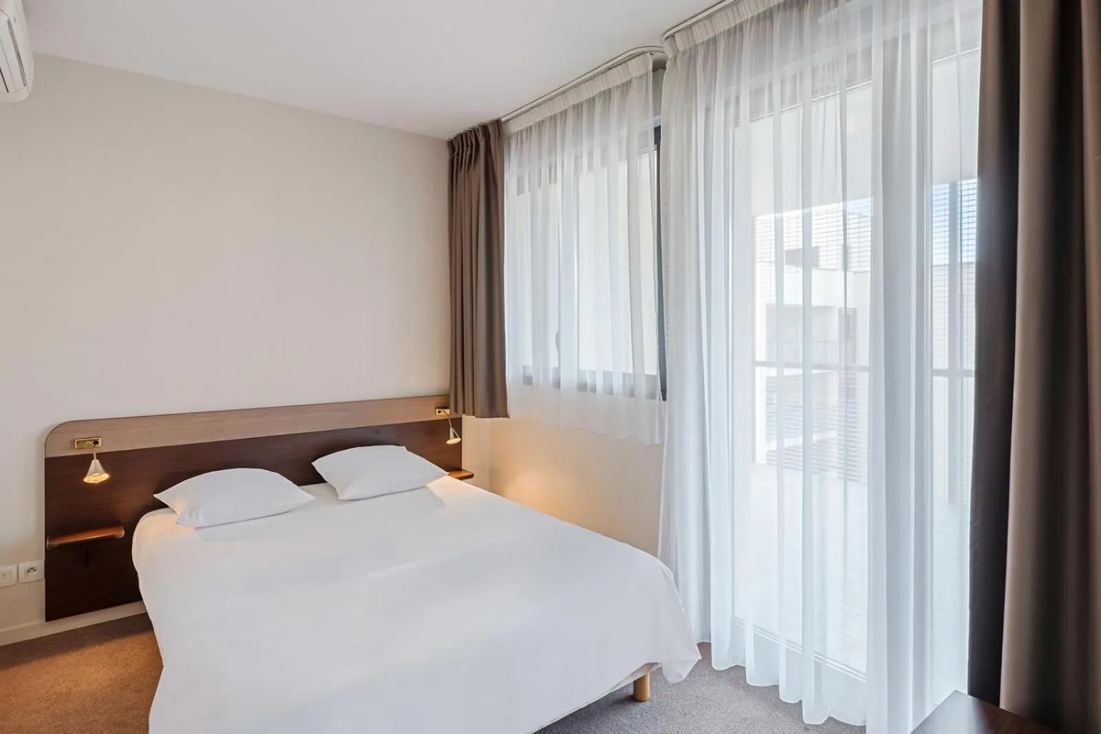 Bed in Appart'City Classic Montelimar