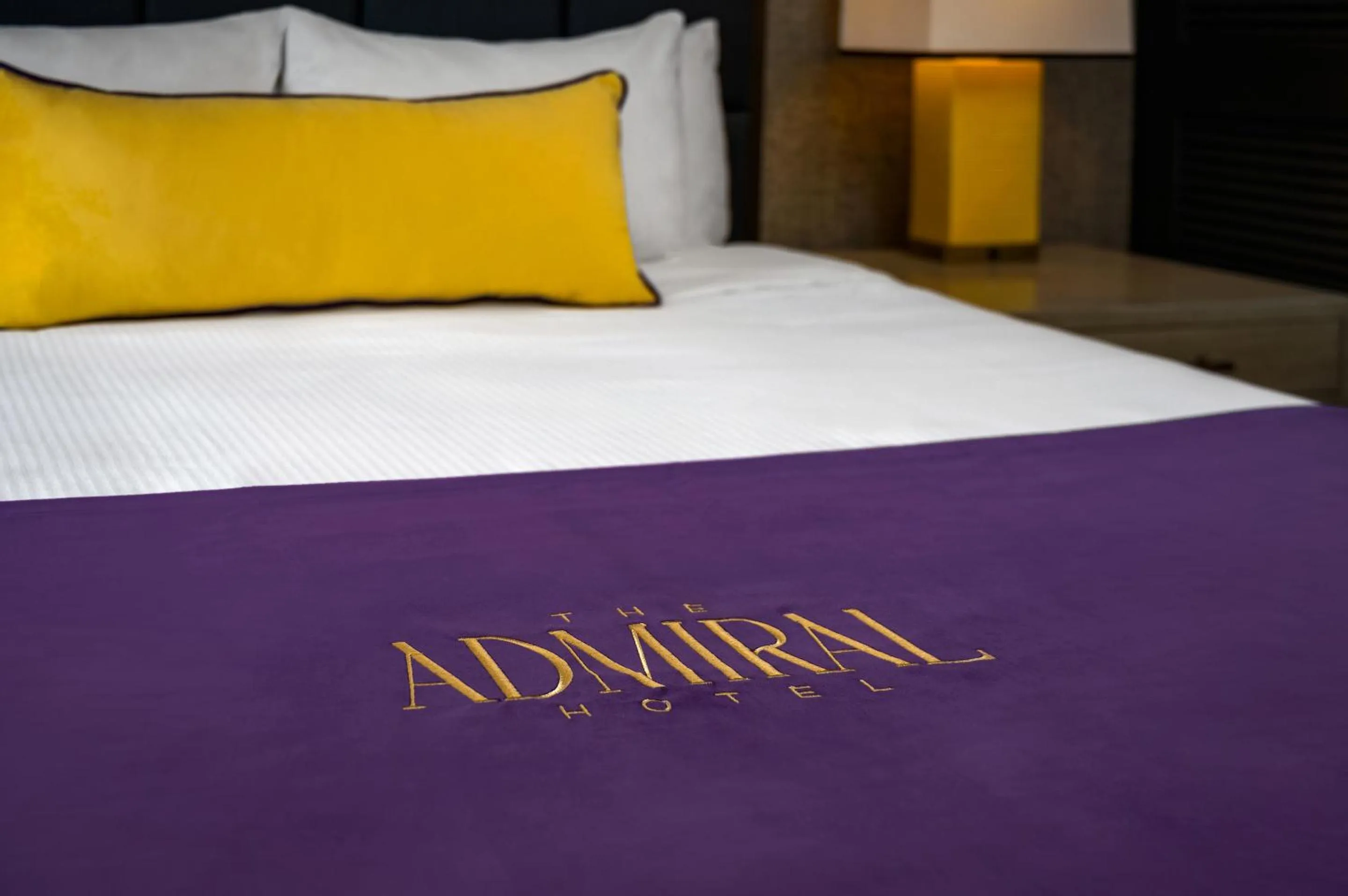 Bed in The Admiral, Downtown Historic District