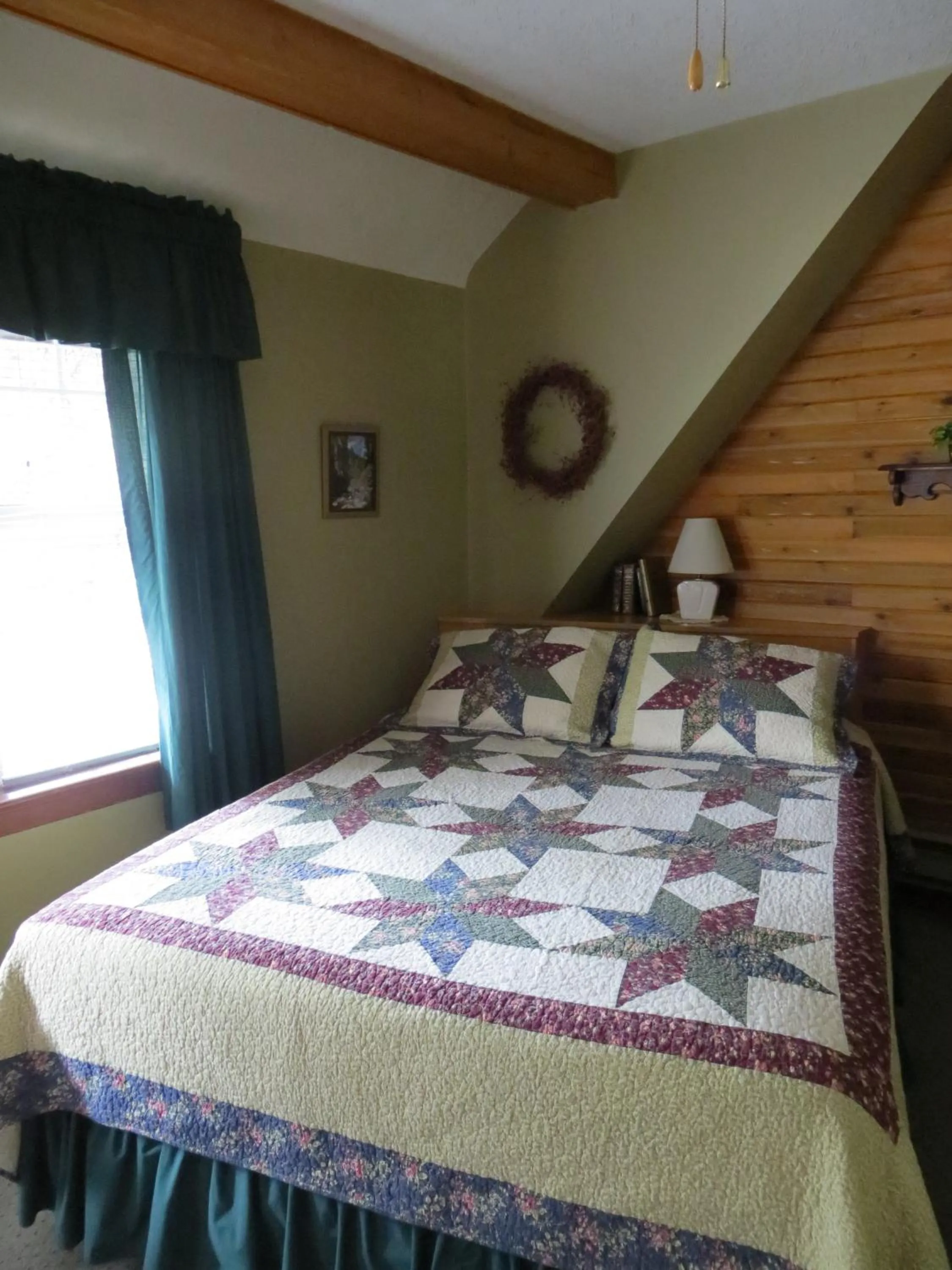 Bed in Crandell Mountain Lodge