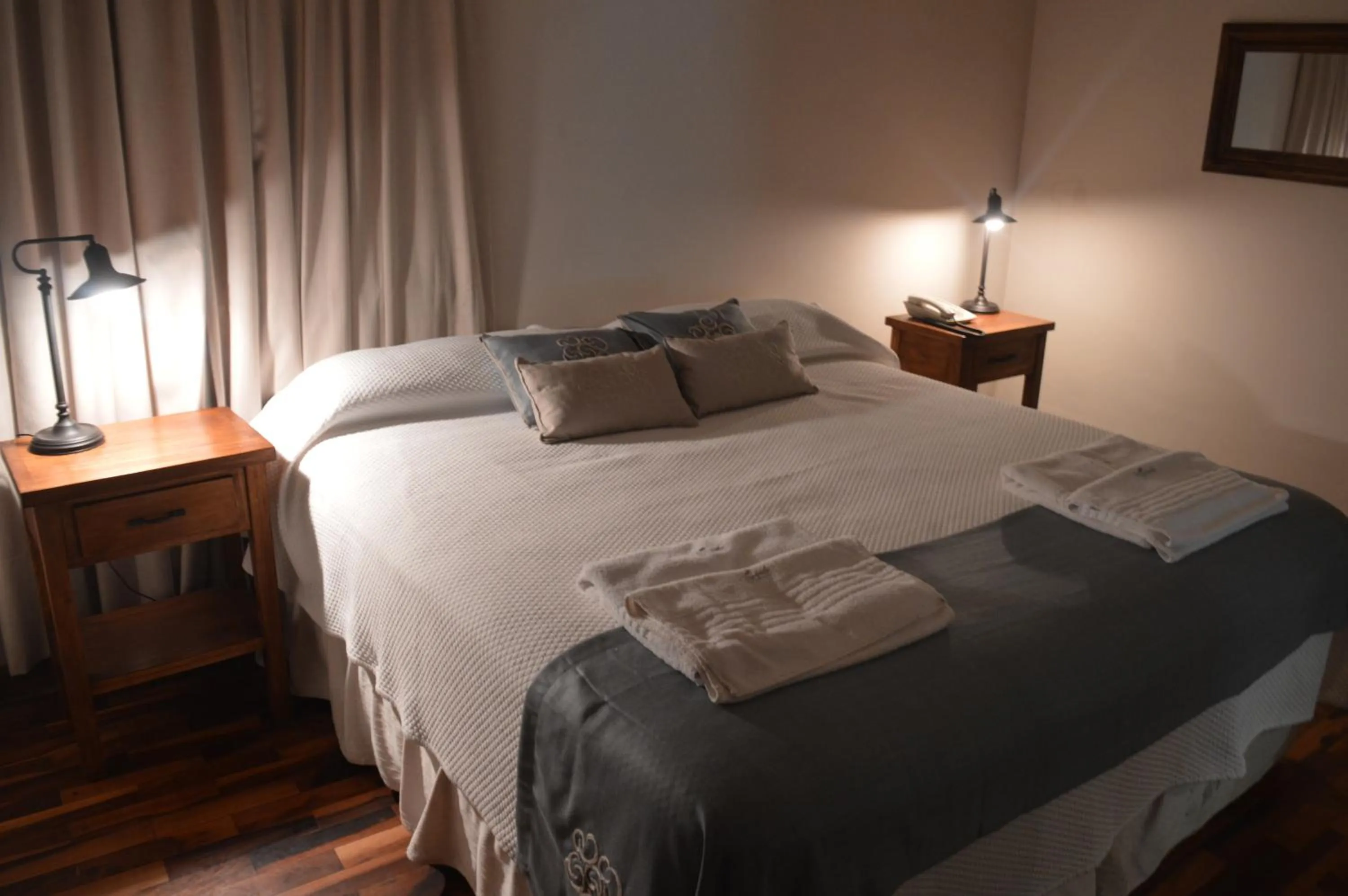 Bed in Río Arriba Suites & Apartments & Restó