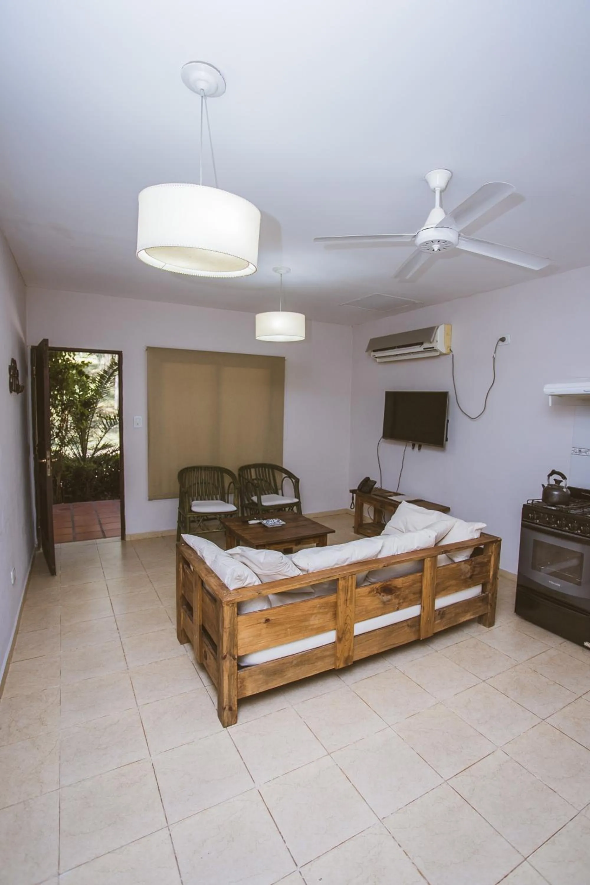 Bed in Río Arriba Suites & Apartments & Restó