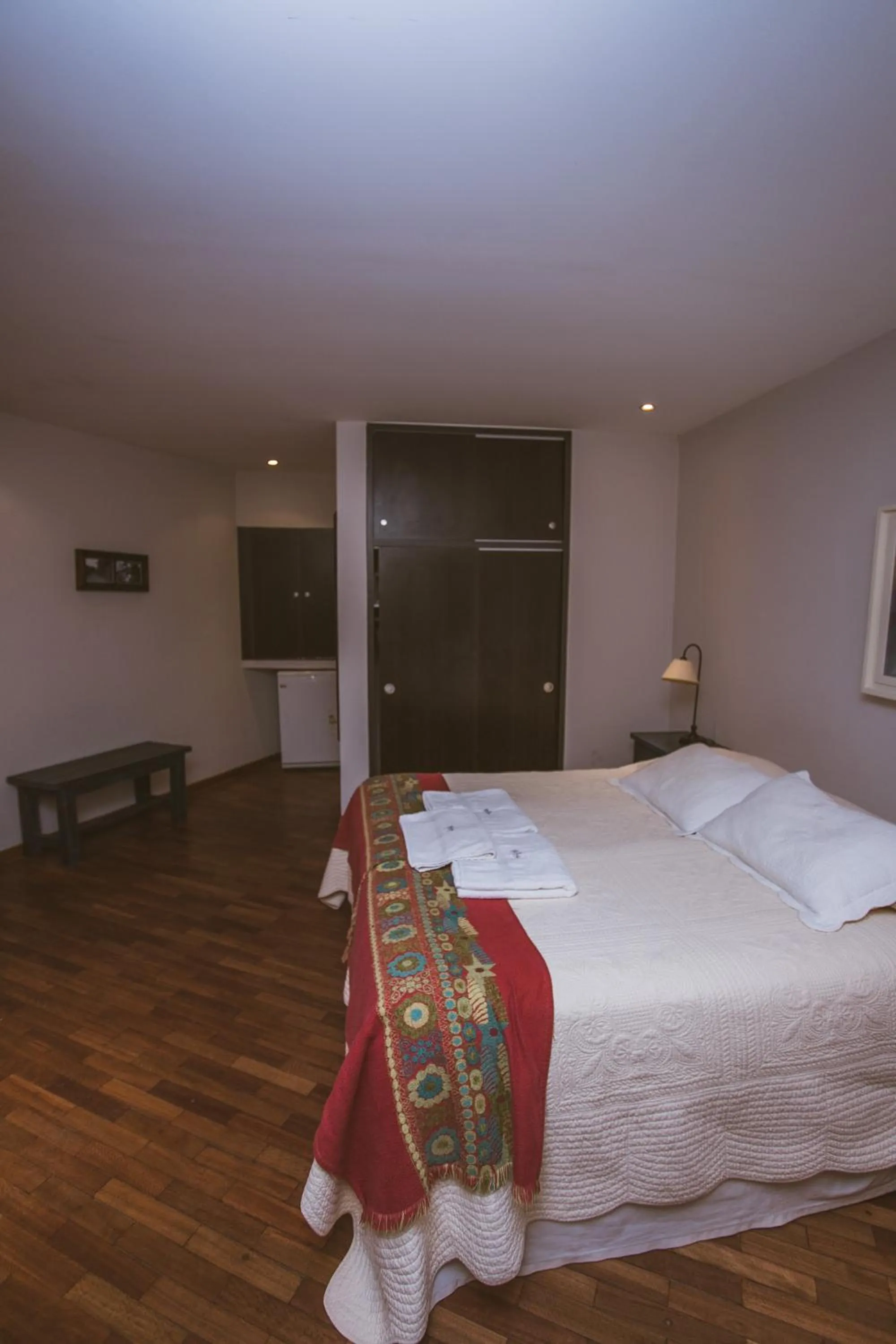 Bed in Río Arriba Suites & Apartments & Restó