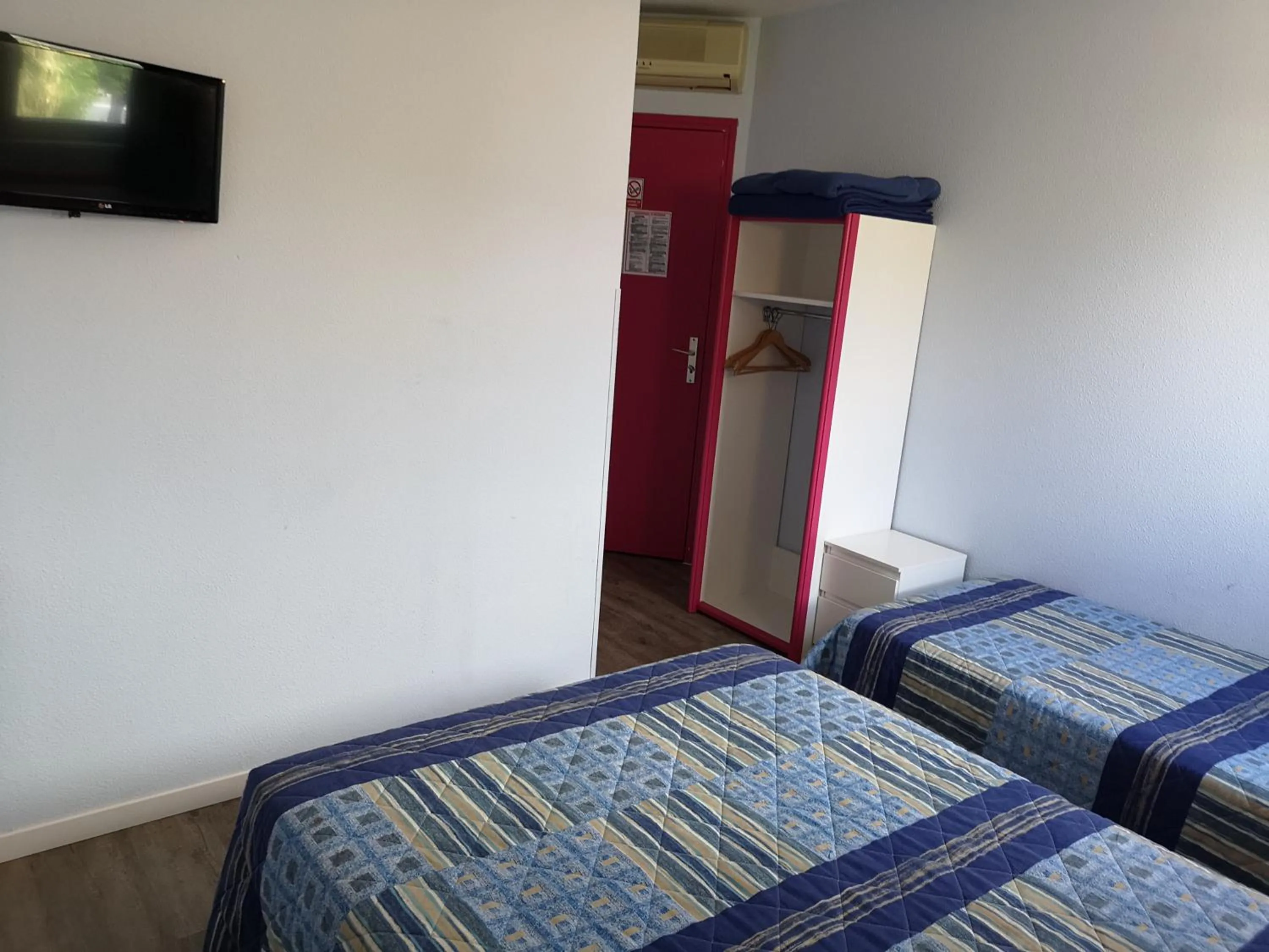 Bed in Hôtel Triotel