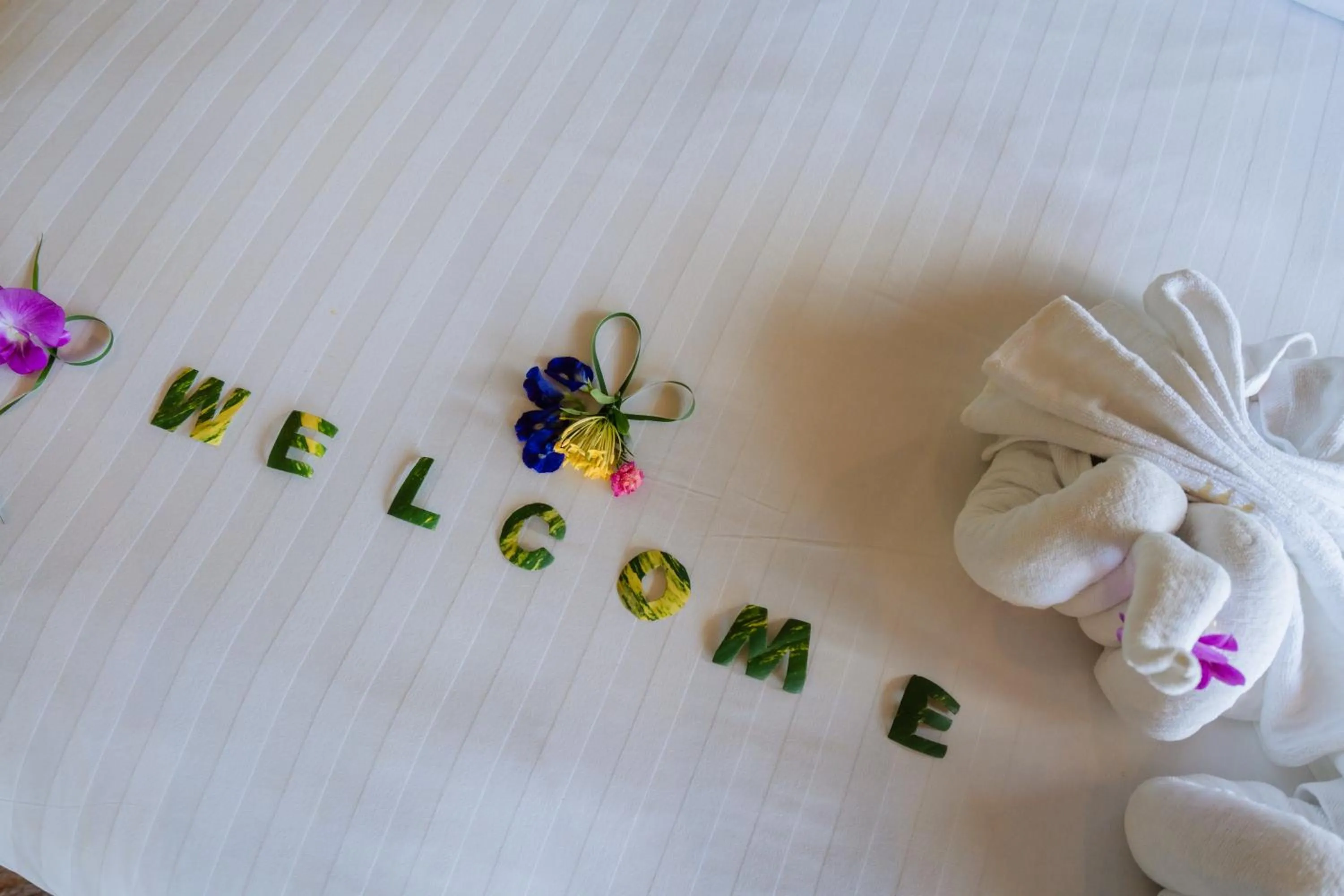 Bed in Club Bamboo Boutique Patong Beach Resort