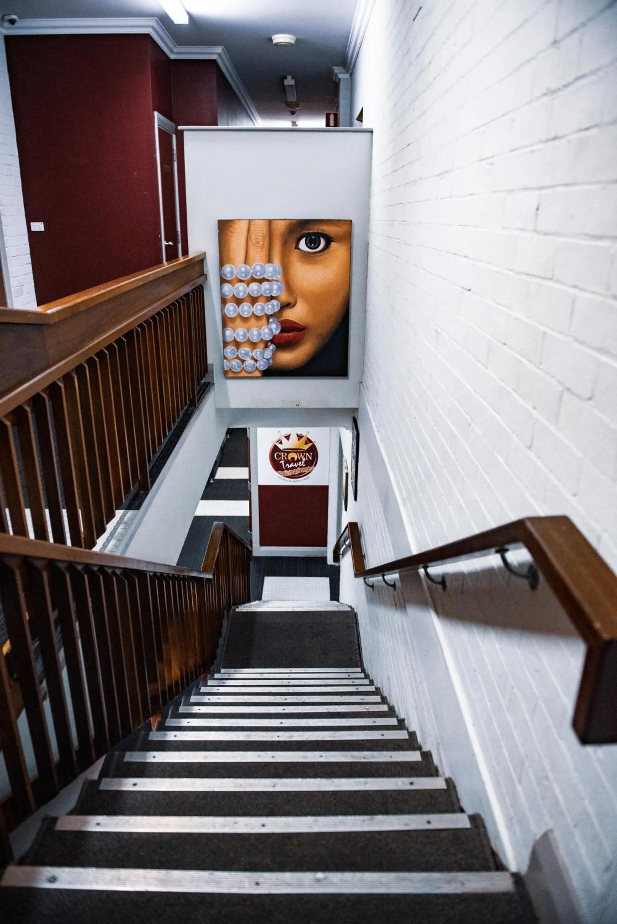 Communal lounge/ TV room in The Emperors Crown Hostel