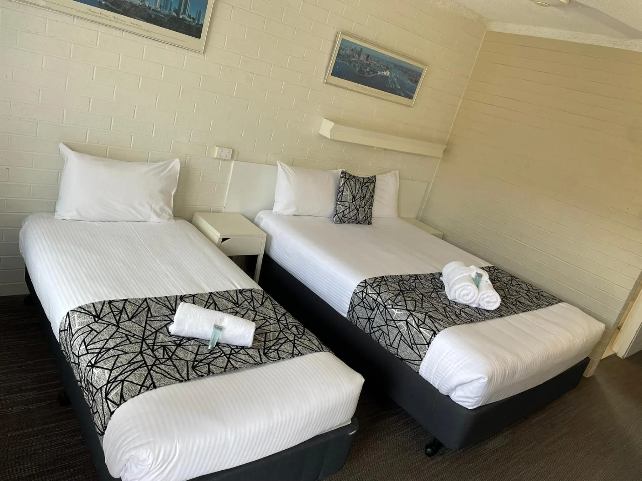 Bed in Coastal Bay Motel