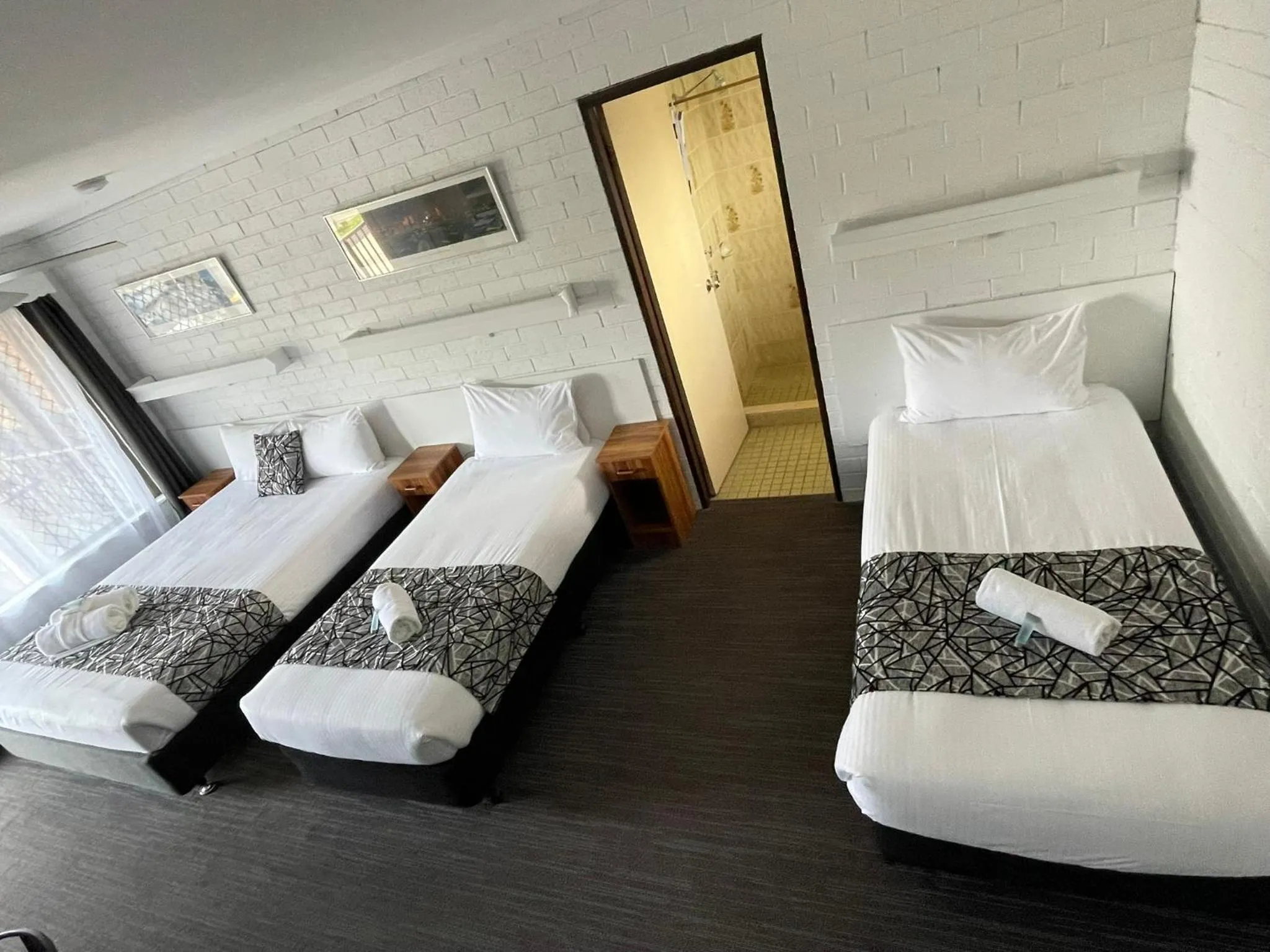 Bed in Coastal Bay Motel