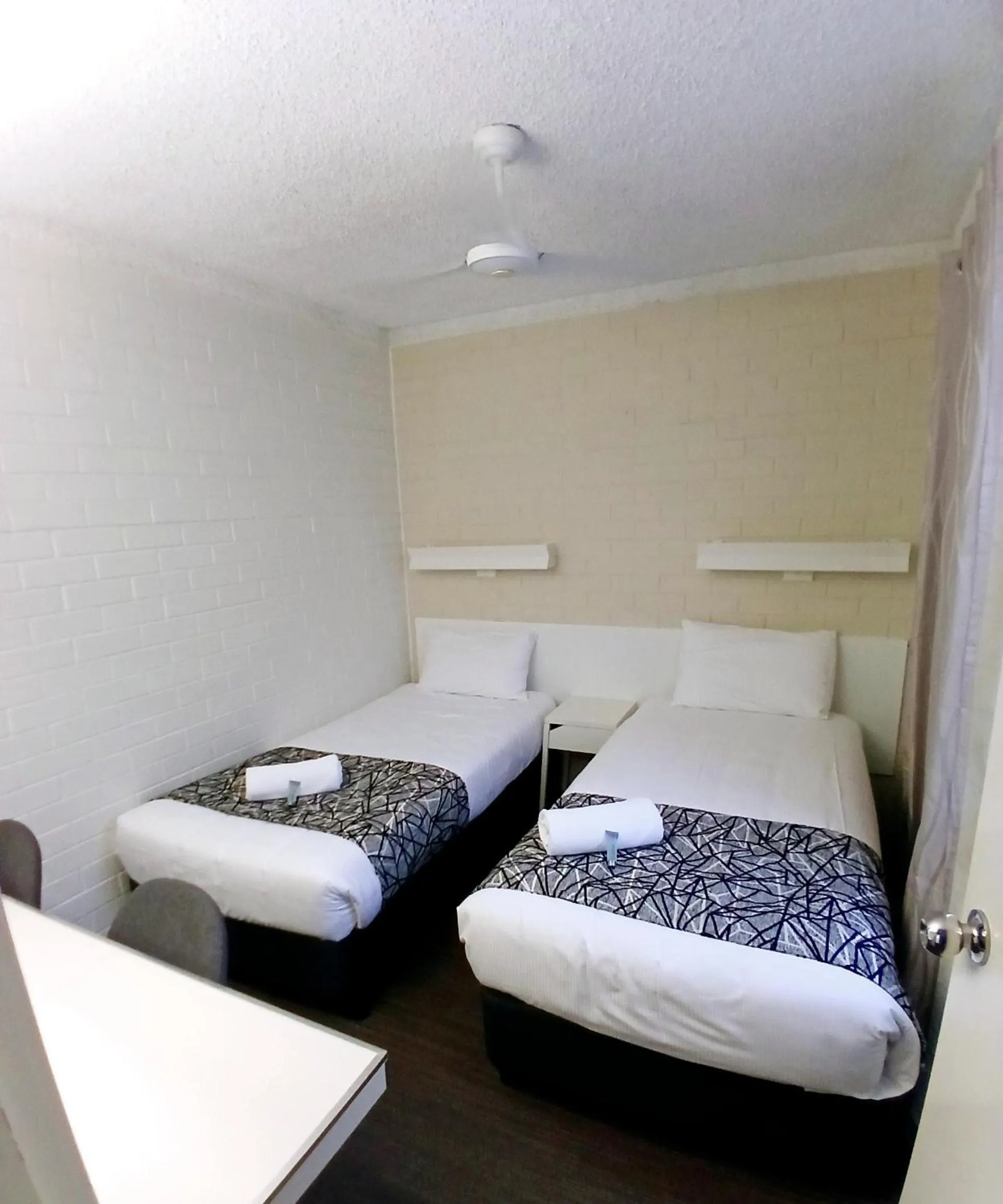 Bed in Coastal Bay Motel