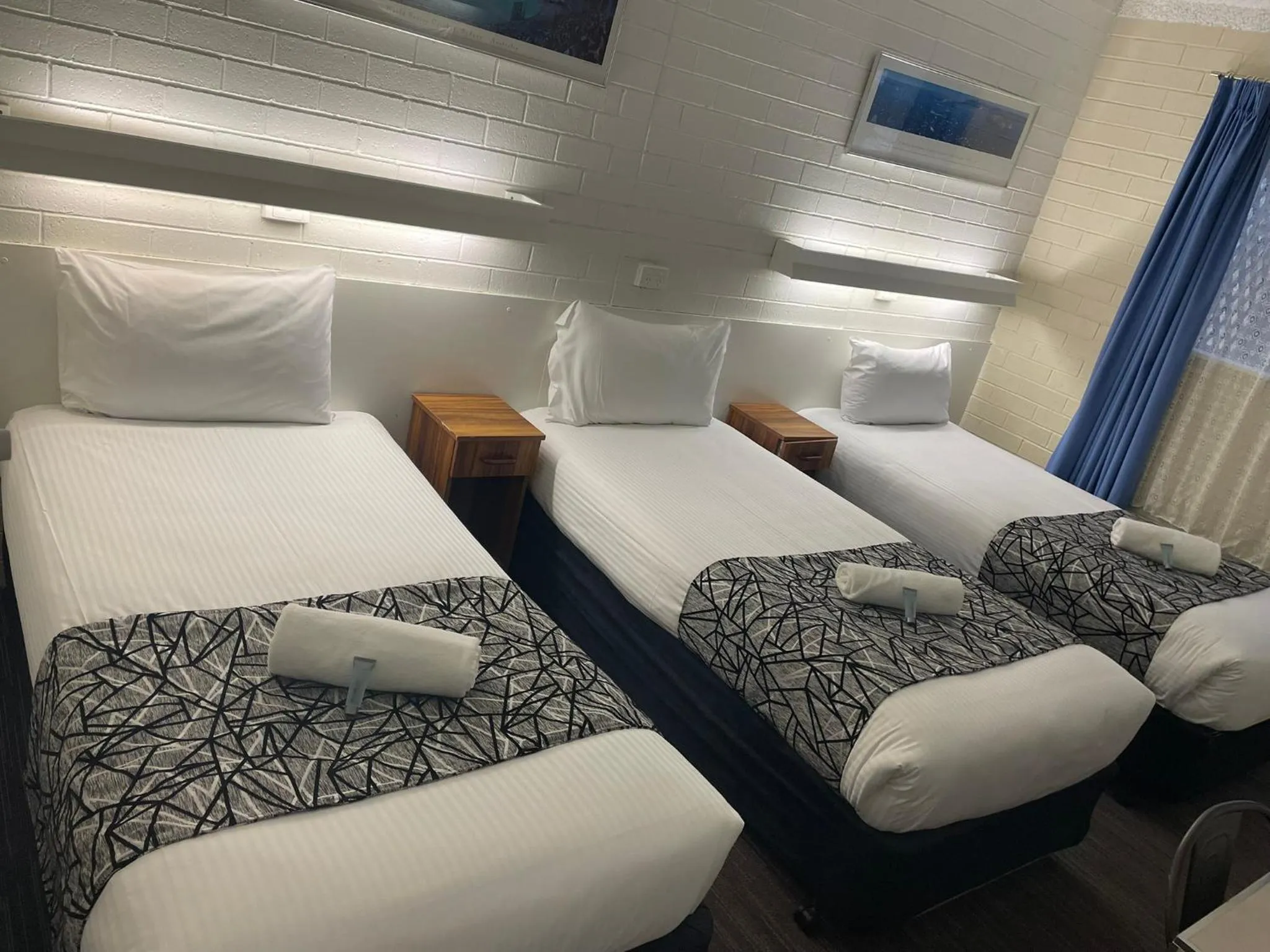 Bed in Coastal Bay Motel