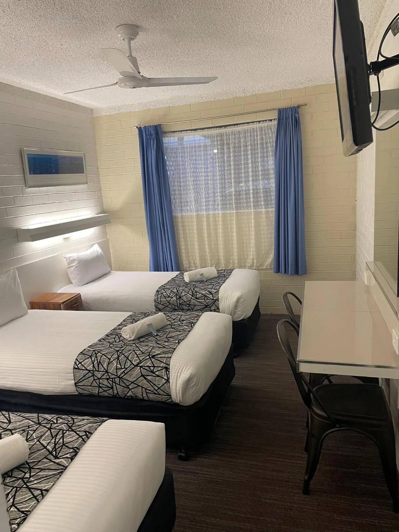 Bed in Coastal Bay Motel