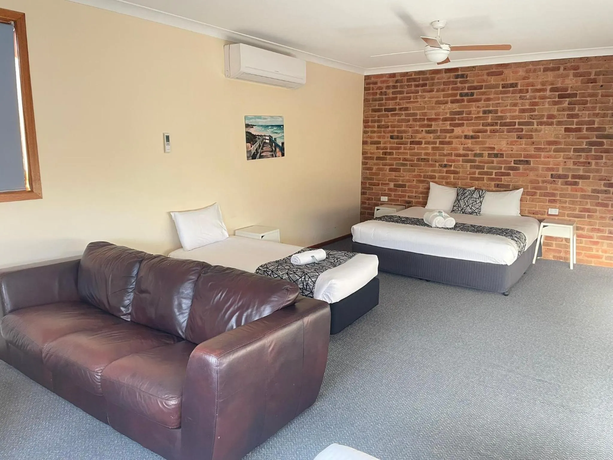 Bed in Coastal Bay Motel