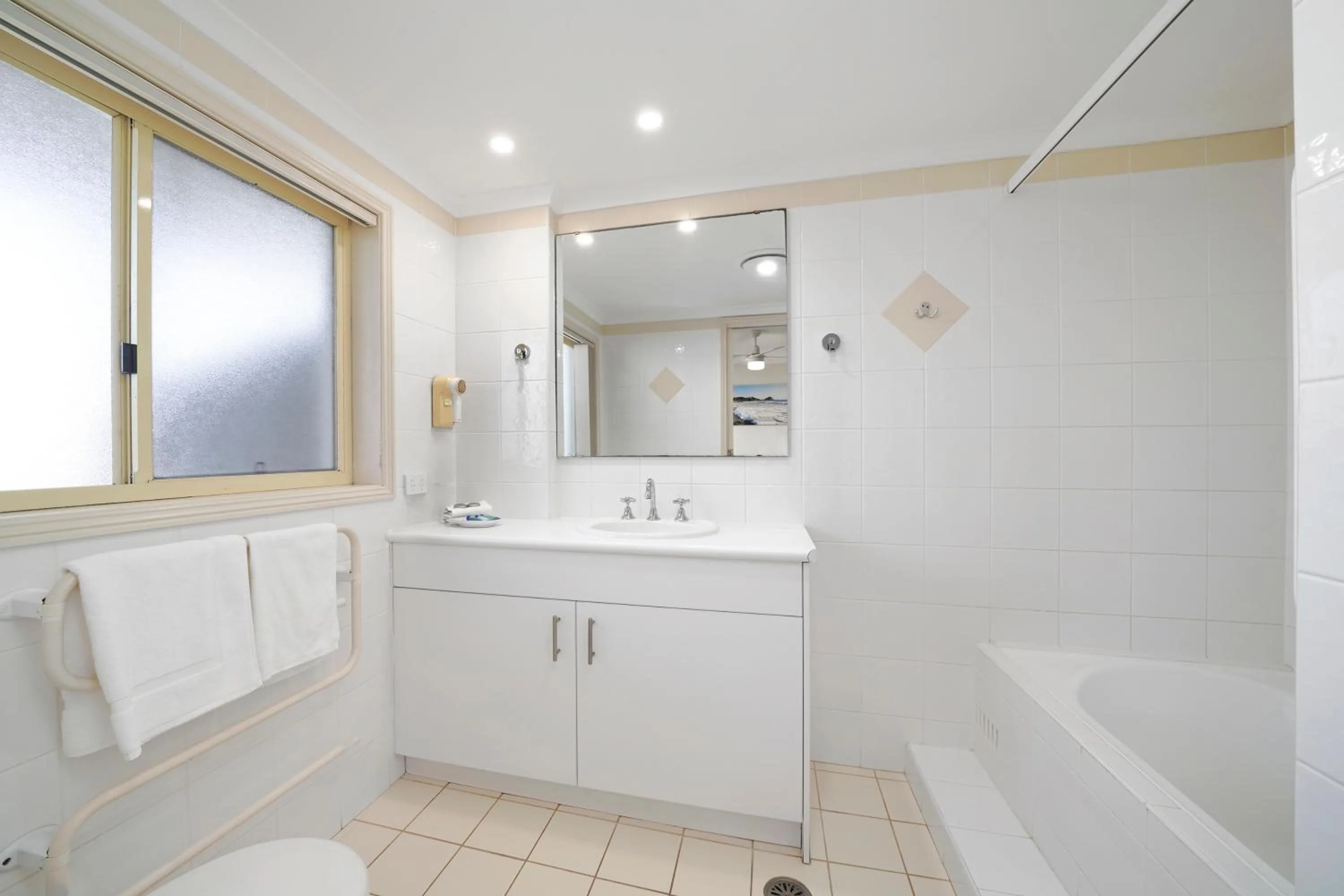 Bathroom in Town Beach Beachcomber Resort