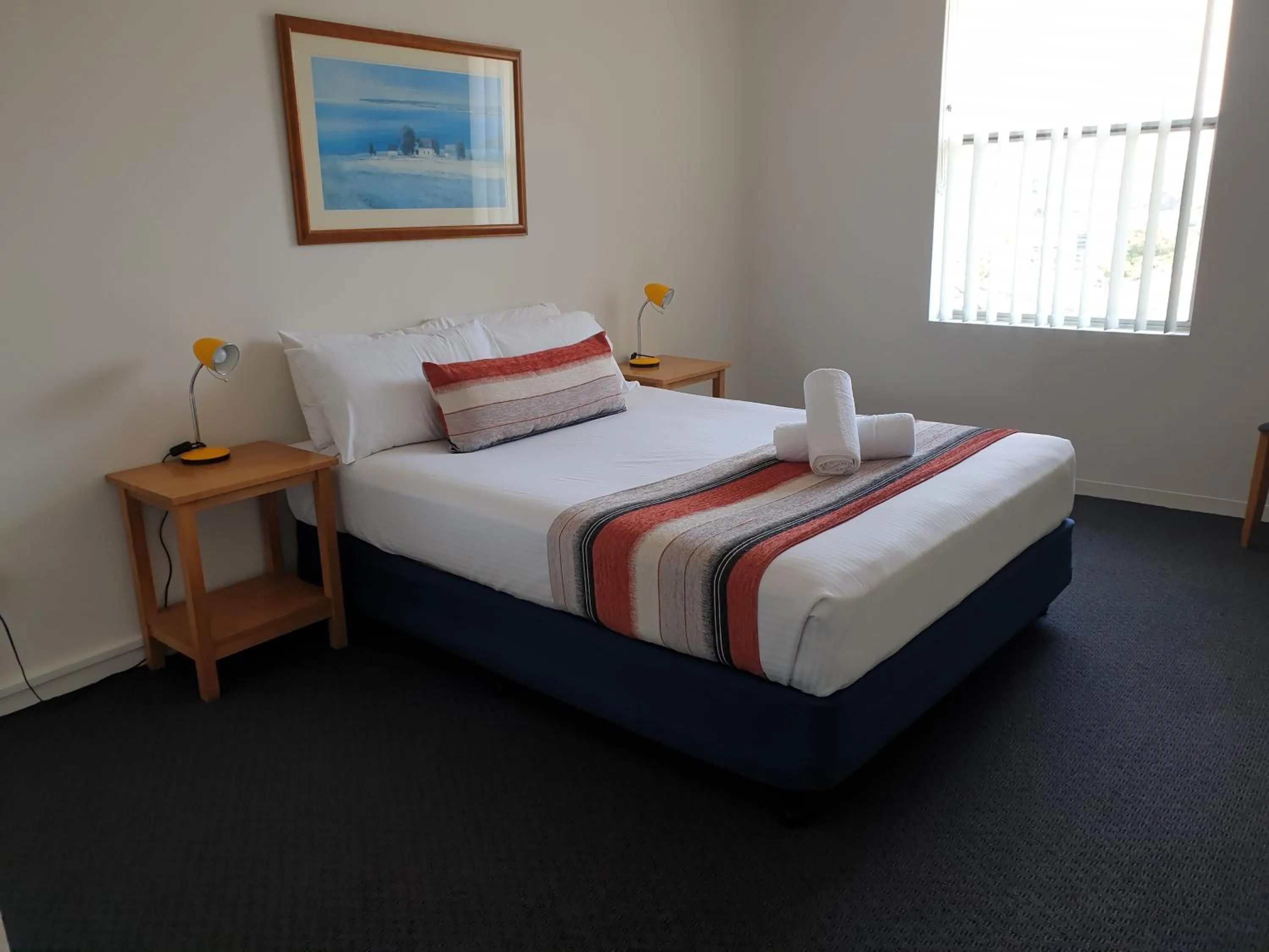 Bed in Oxley Cove Holiday Apartment
