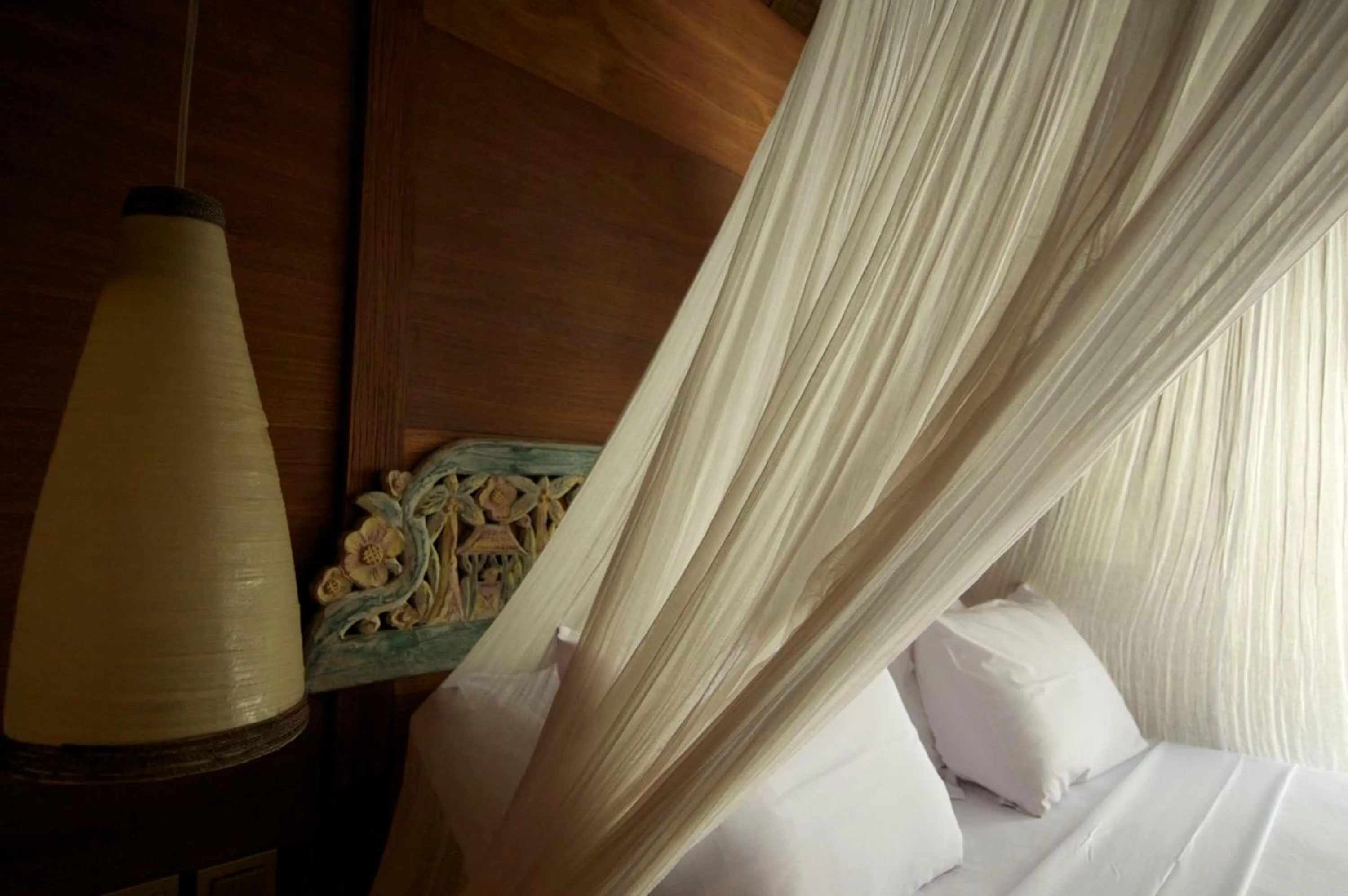 Bed in Puri Dajuma Beach Eco-Resort & Spa