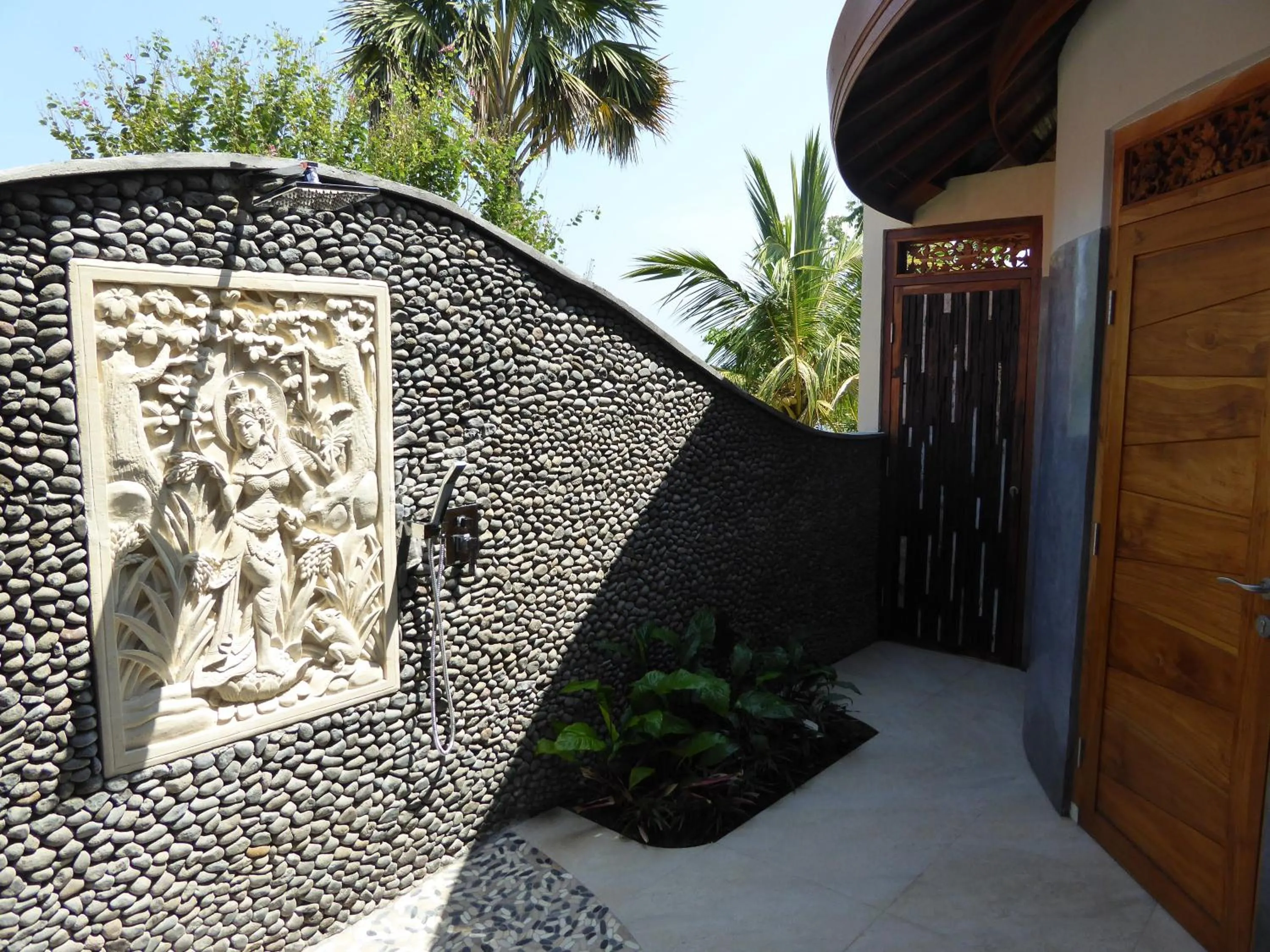 Bathroom in Puri Dajuma Beach Eco-Resort & Spa