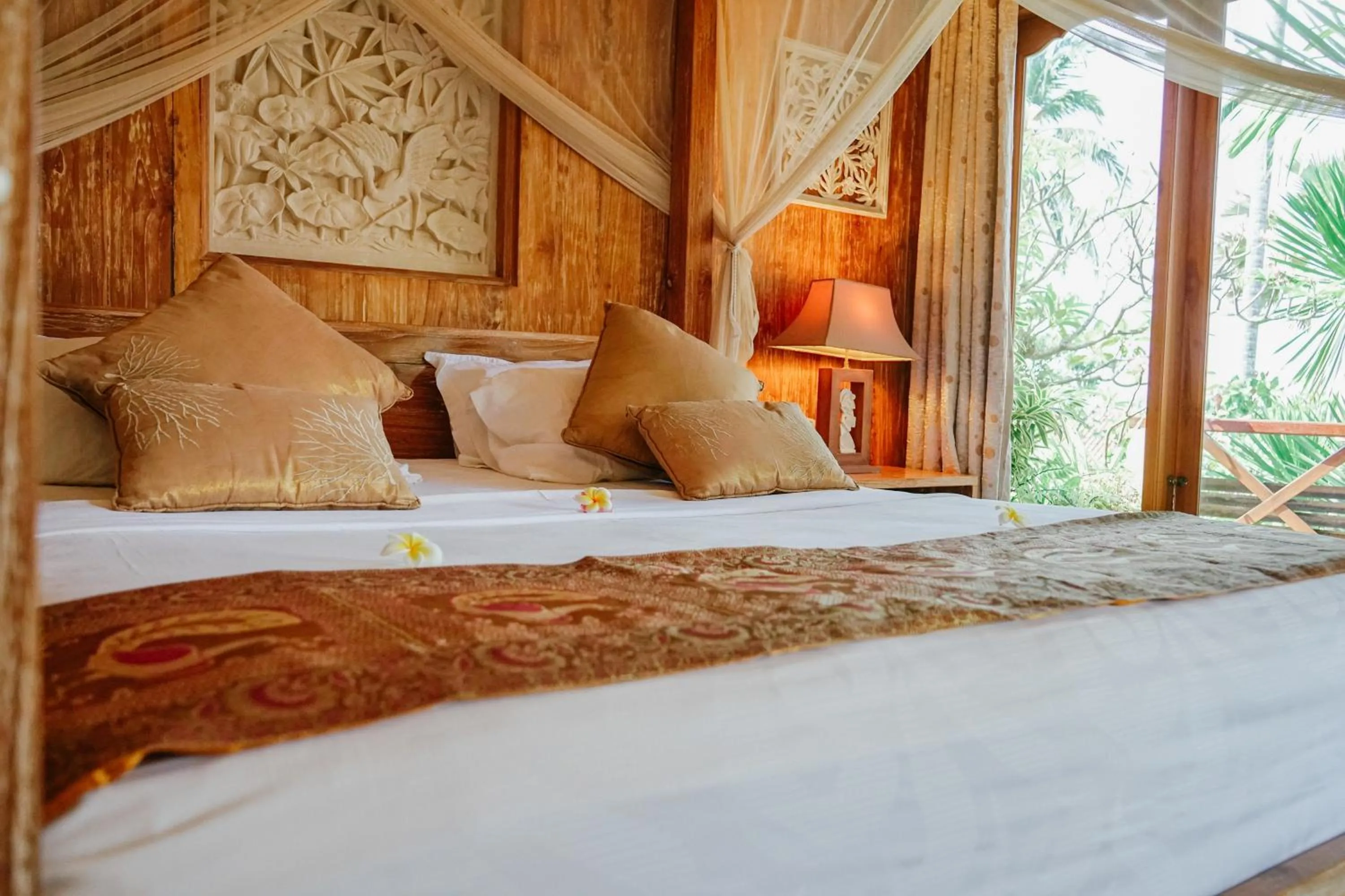 Bed in Puri Dajuma Beach Eco-Resort & Spa