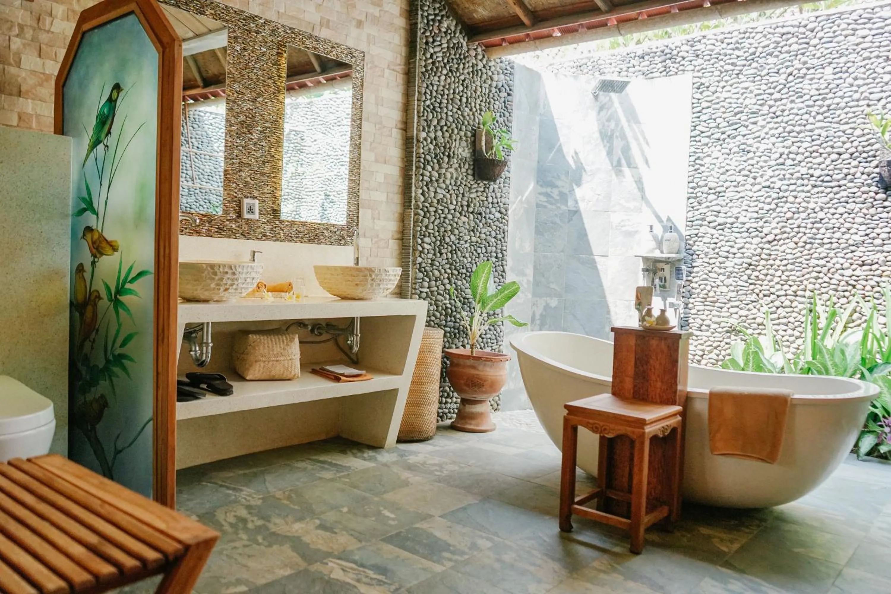 Bathroom in Puri Dajuma Beach Eco-Resort & Spa