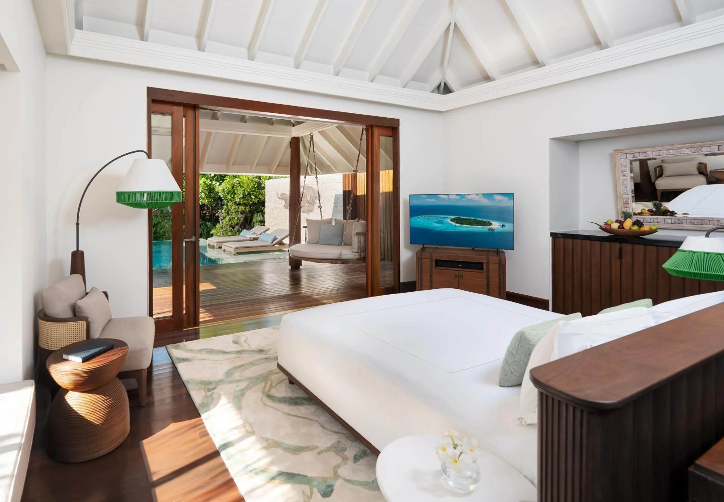 Bed in Anantara Kihavah Maldives Villas