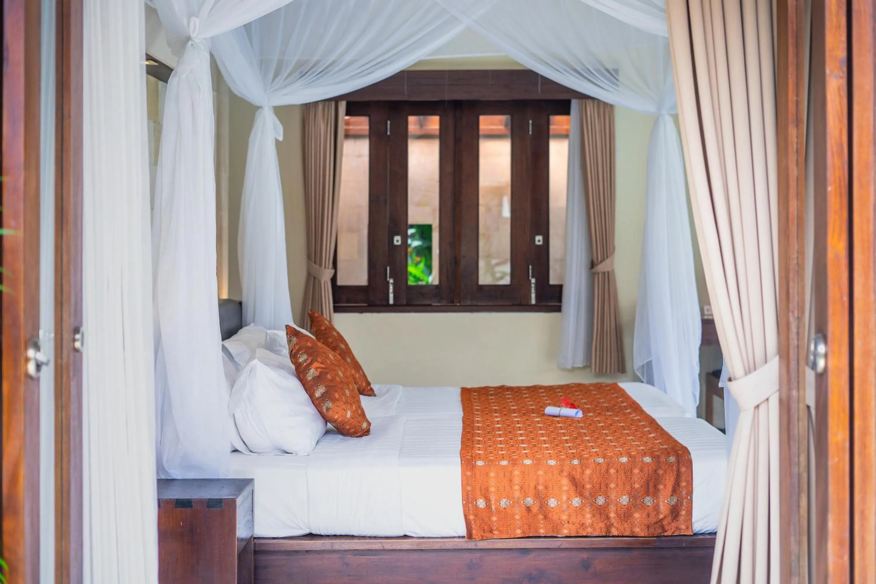 Bed in The Maya Seminyak Villas