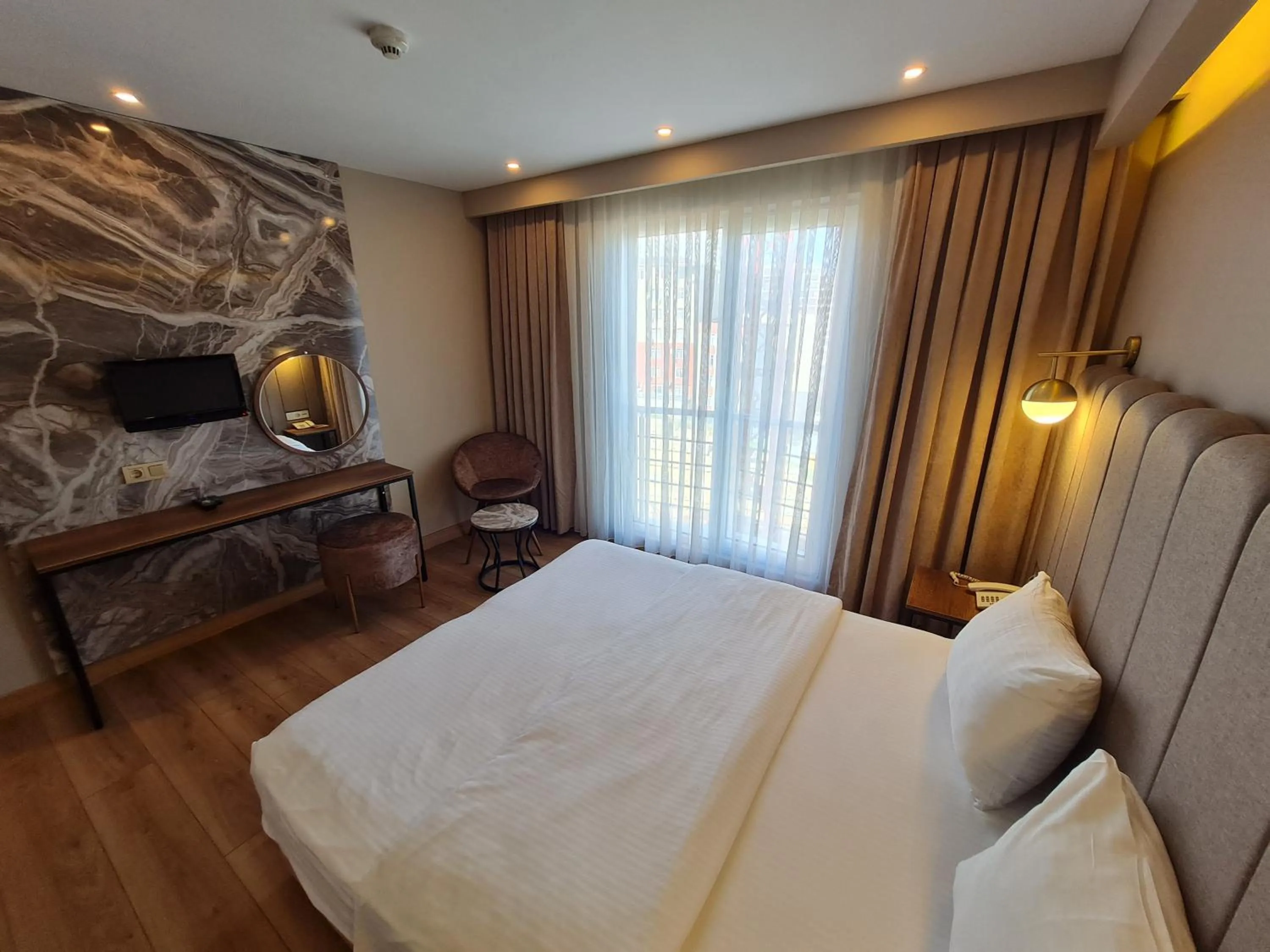 Photo of the whole room, Bed in Air Boss Istanbul Airport and Fair Hotel