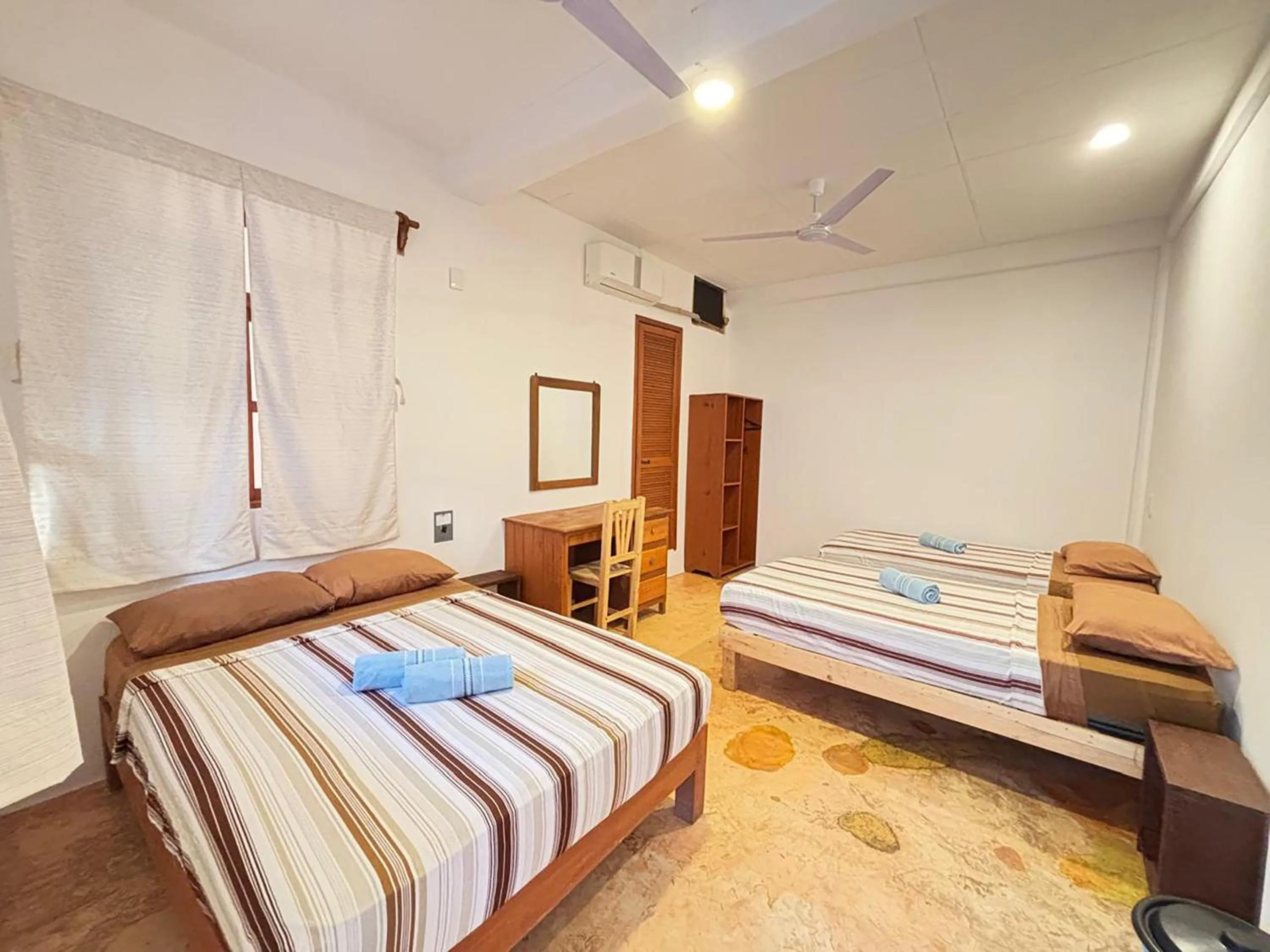 Bed in Hotel Papaya Surf