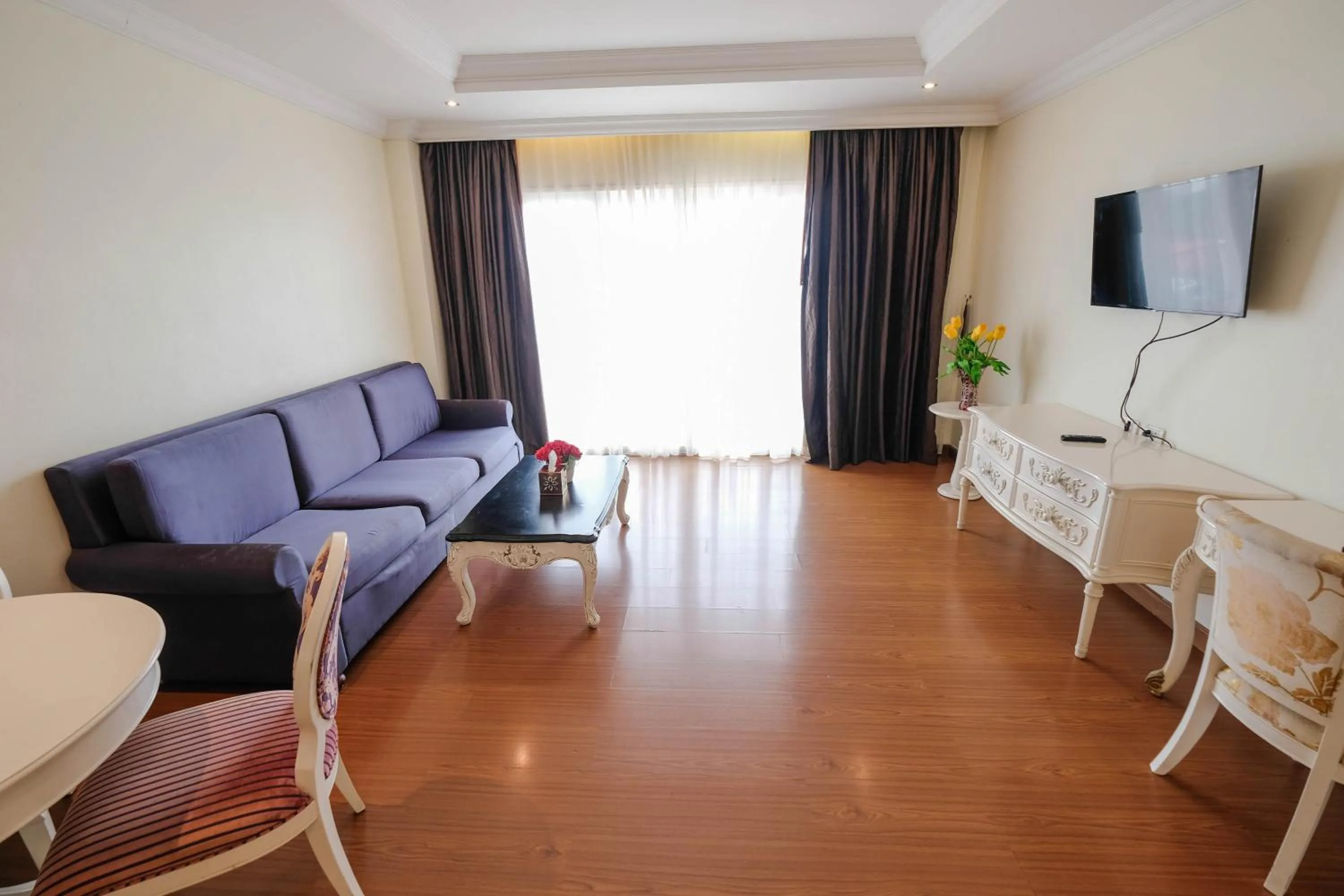 Communal lounge/ TV room in LK Miracle Suite - SHA Extra Plus