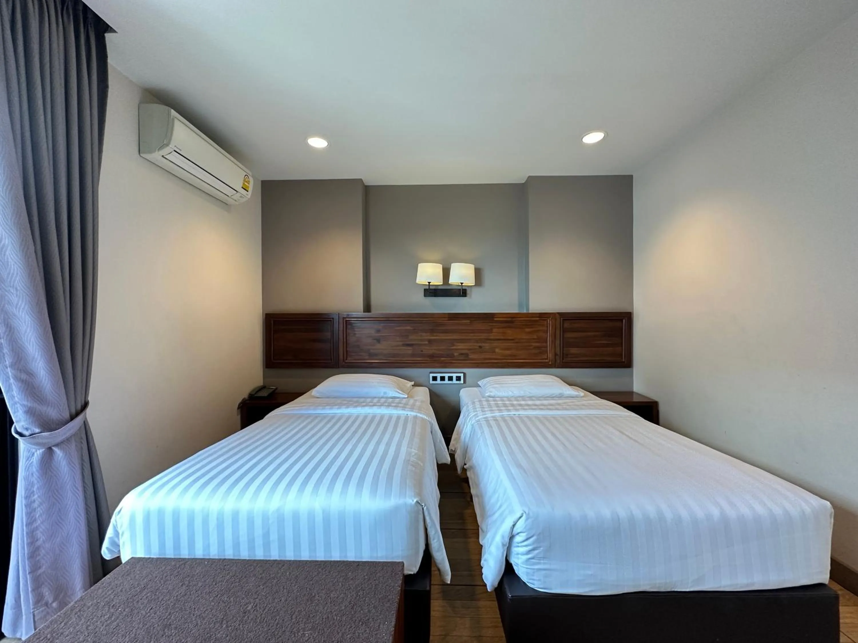 Bed in Mangrove Prestige Hotel