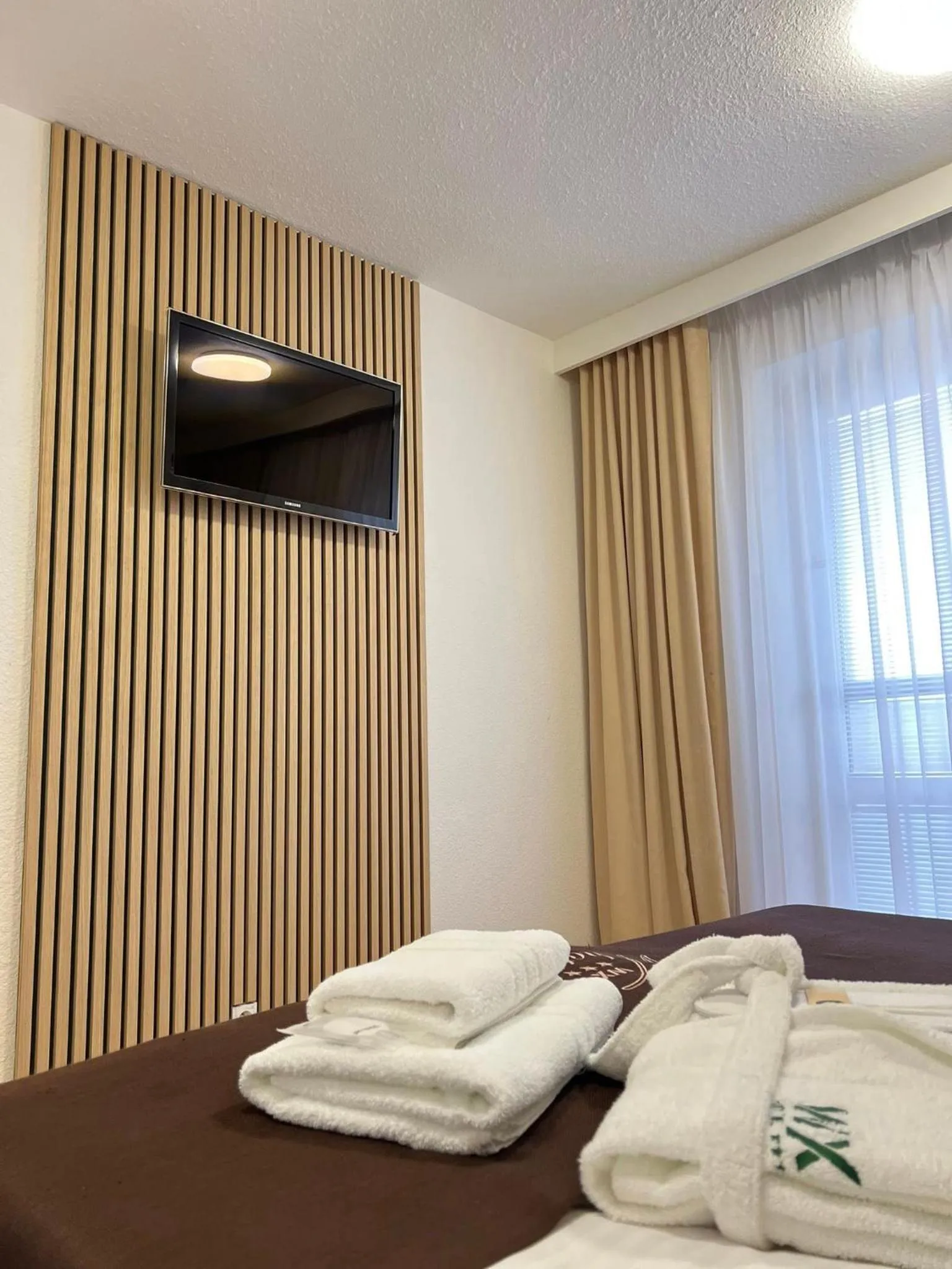 Photo of the whole room, Bed in WX Hotel