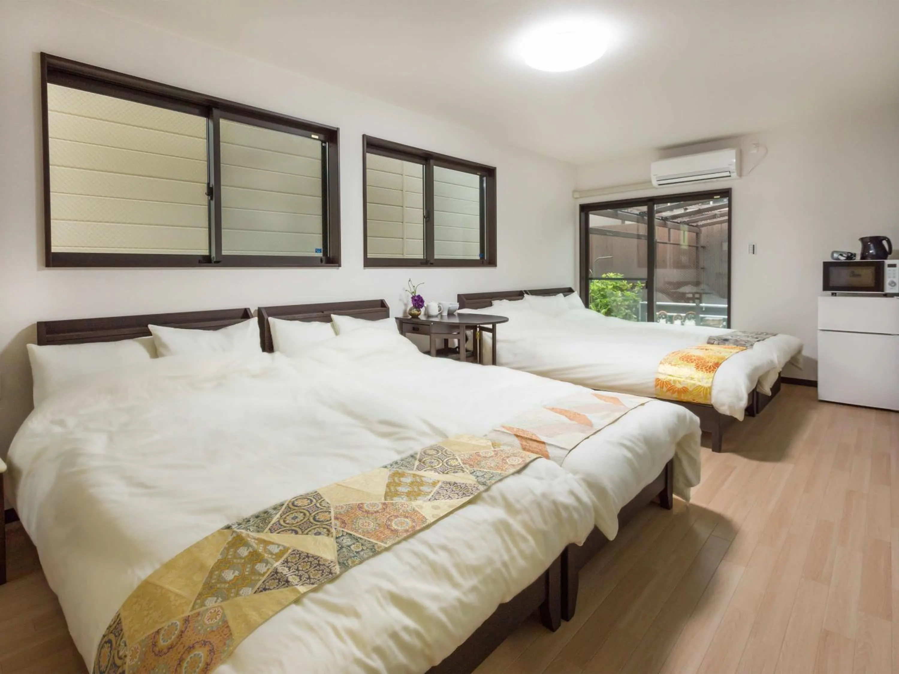 Photo of the whole room, Bed in Marikoji Inn Kyoto