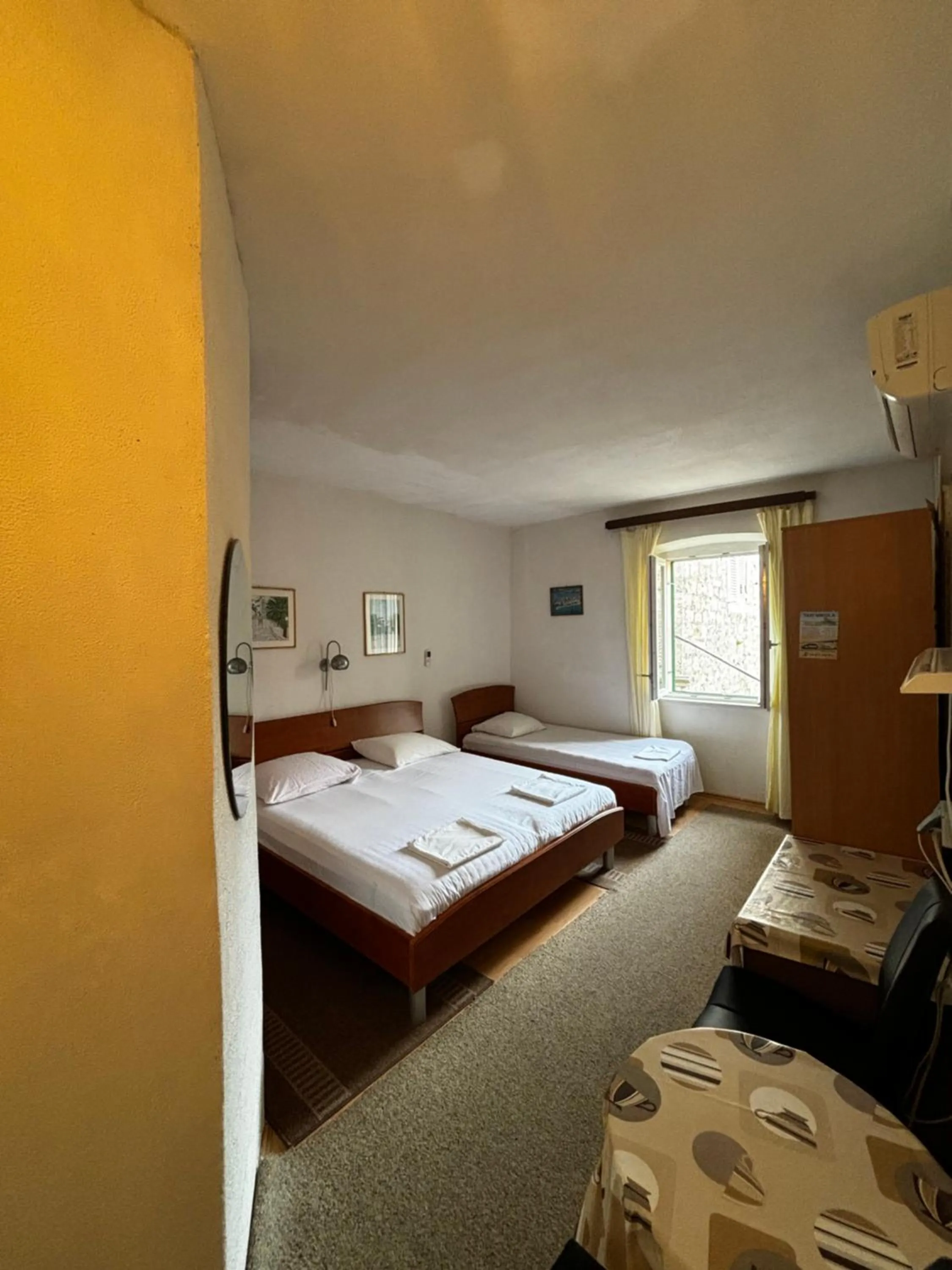 Bed in Accommodation Old Town Vitaic