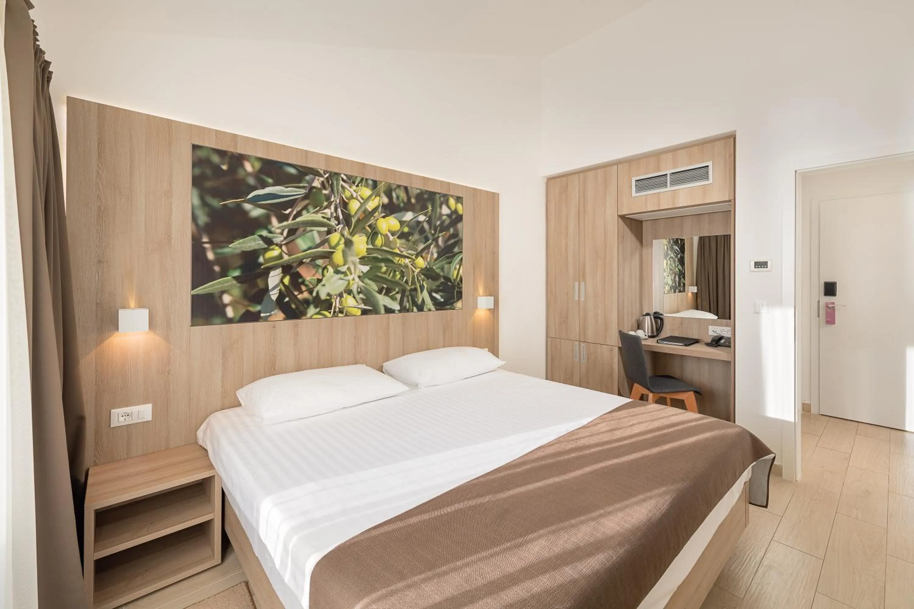 Photo of the whole room, Bed in Medora Auri Family Beach Resort