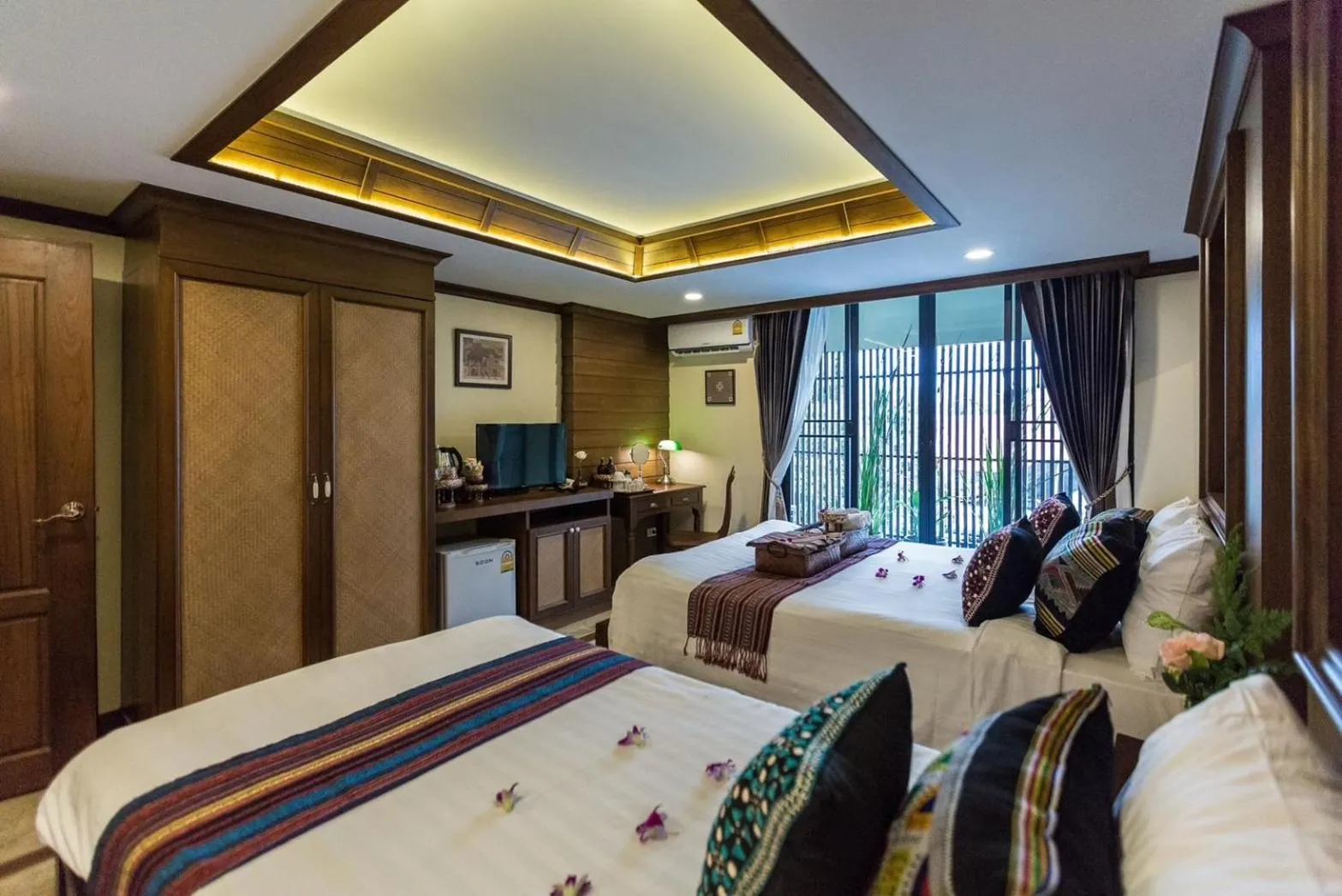 Bed in Wannamas Chiangmai Boutique House